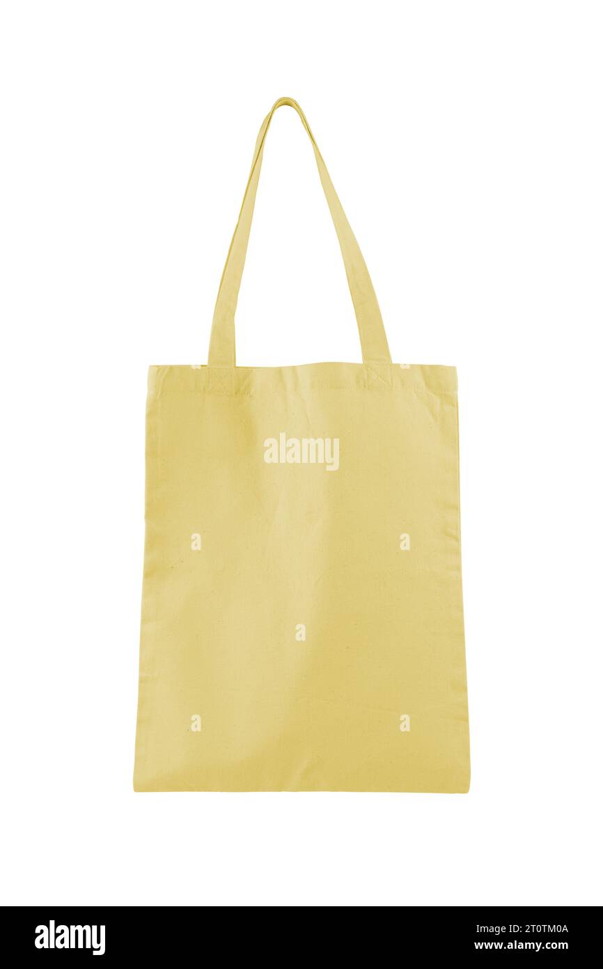 Tissu coton, sac à provisions en lin, sac fourre-tout isolé sur fond blanc. Sac d'épicerie jaune réutilisable, maquette, modèle pour la conception, copie spa Banque D'Images