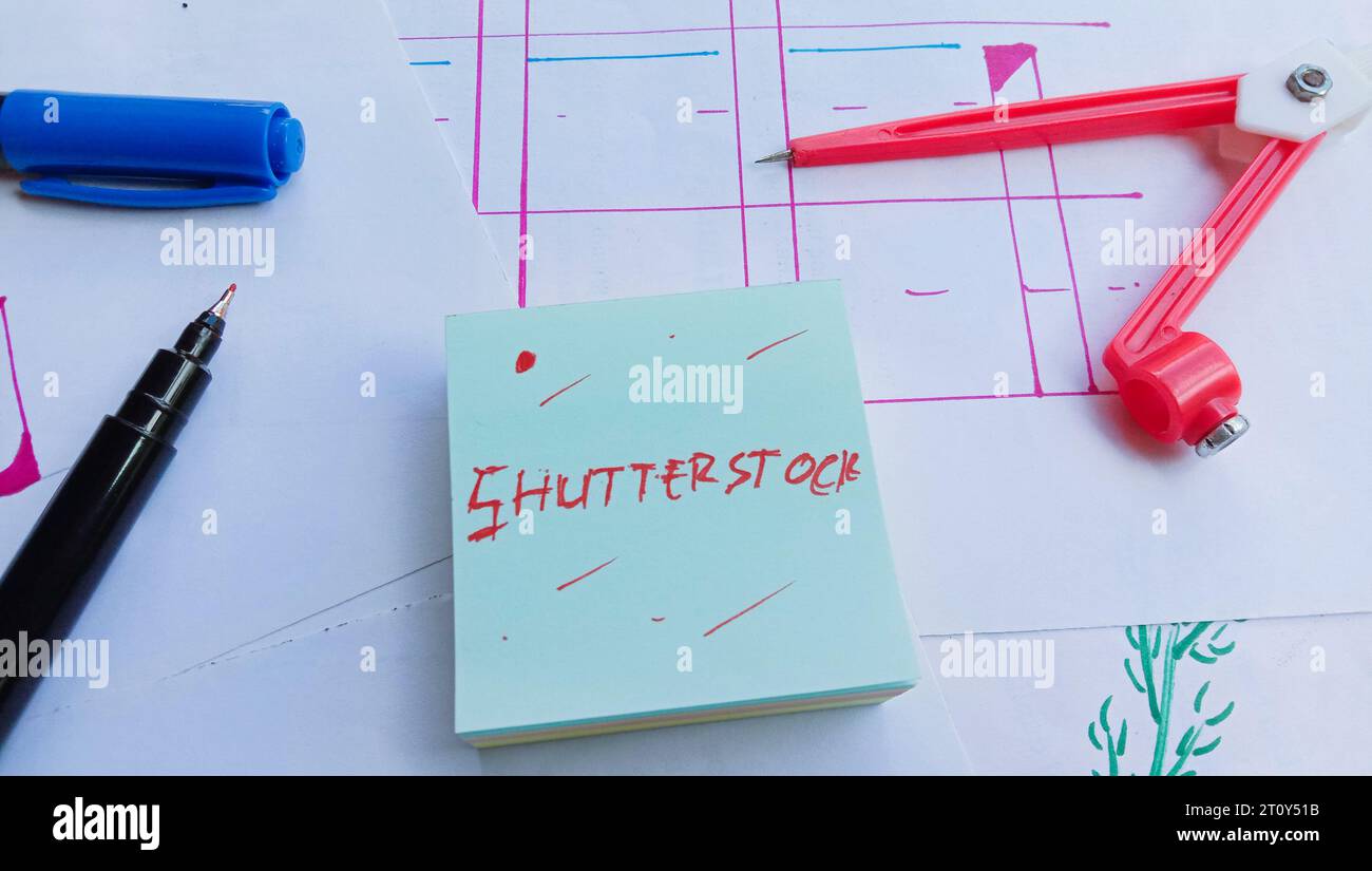 Photographie d'un objet sur le thème de l'entreprise et de l'argent avec texte à l'intérieur de la note indiquant « Shutterstock » Banque D'Images