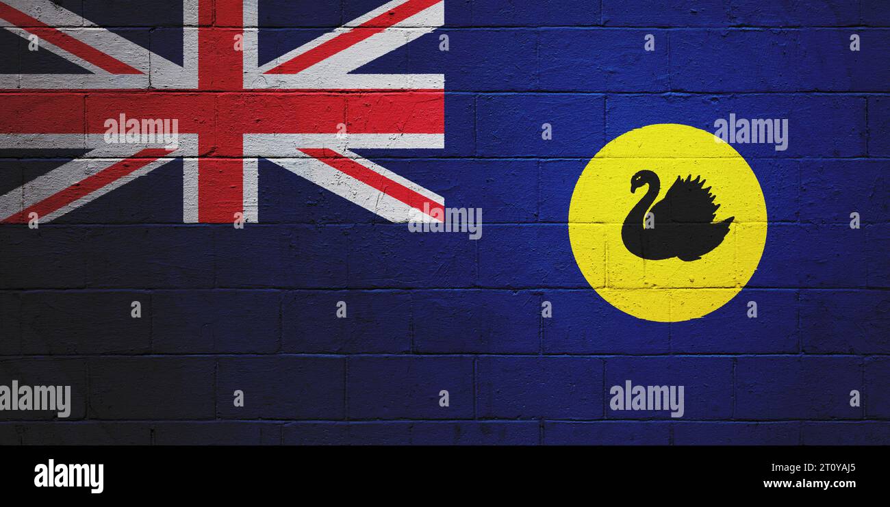 Drapeau de l'Australie occidentale peint sur un mur en blocs de cendre. Banque D'Images