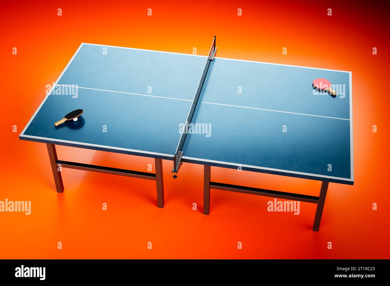 Une installation professionnelle d'une table de ping-pong bleue debout dans une pièce vide avec un sol rouge vibrant. Des raquettes et une balle sont placées sur la table, rea Banque D'Images