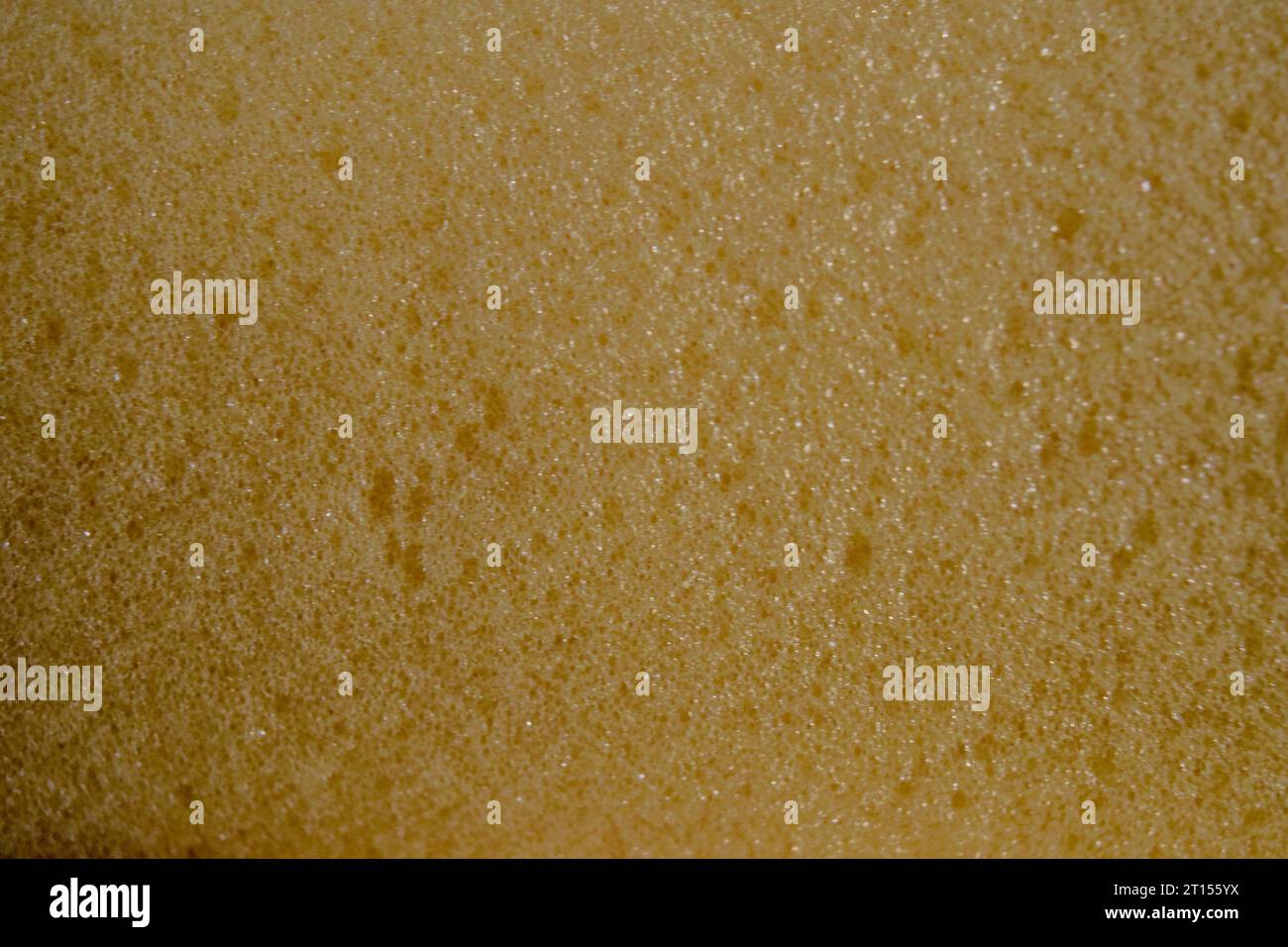 détail de la texture en caoutchouc mousse jaune Banque D'Images