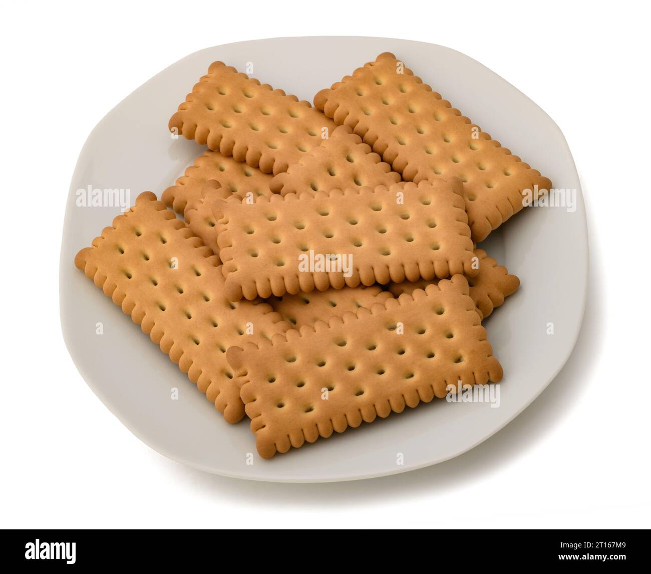 Les biscuits groupent sur une plaque isolée sur blanc Banque D'Images