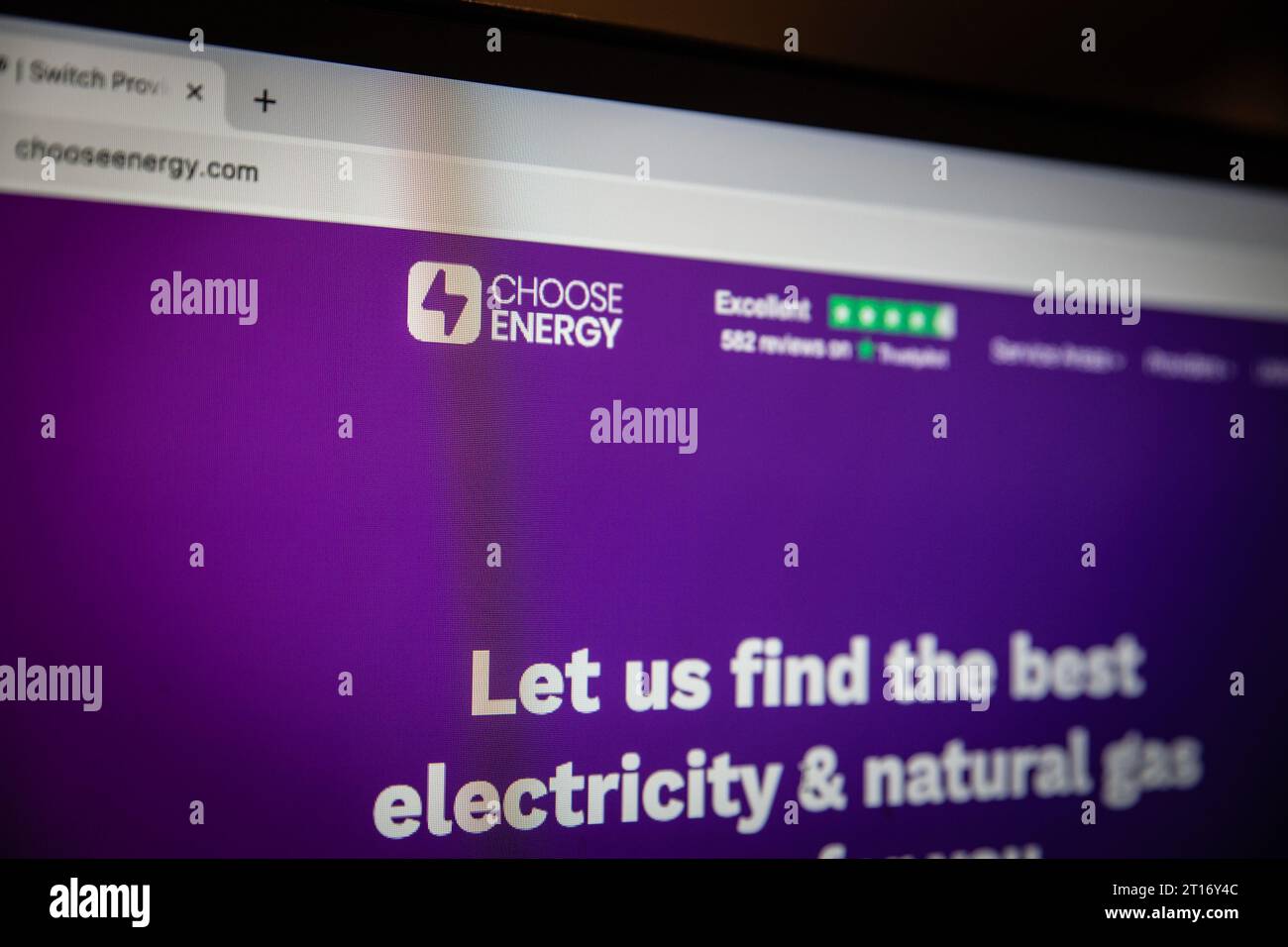 Photo d'un panneau avec le logo de Choose Energy sur leur site Web. Choisir l'énergie est une entreprise qui fait la comparaison des prix parmi les services publics fournis Banque D'Images
