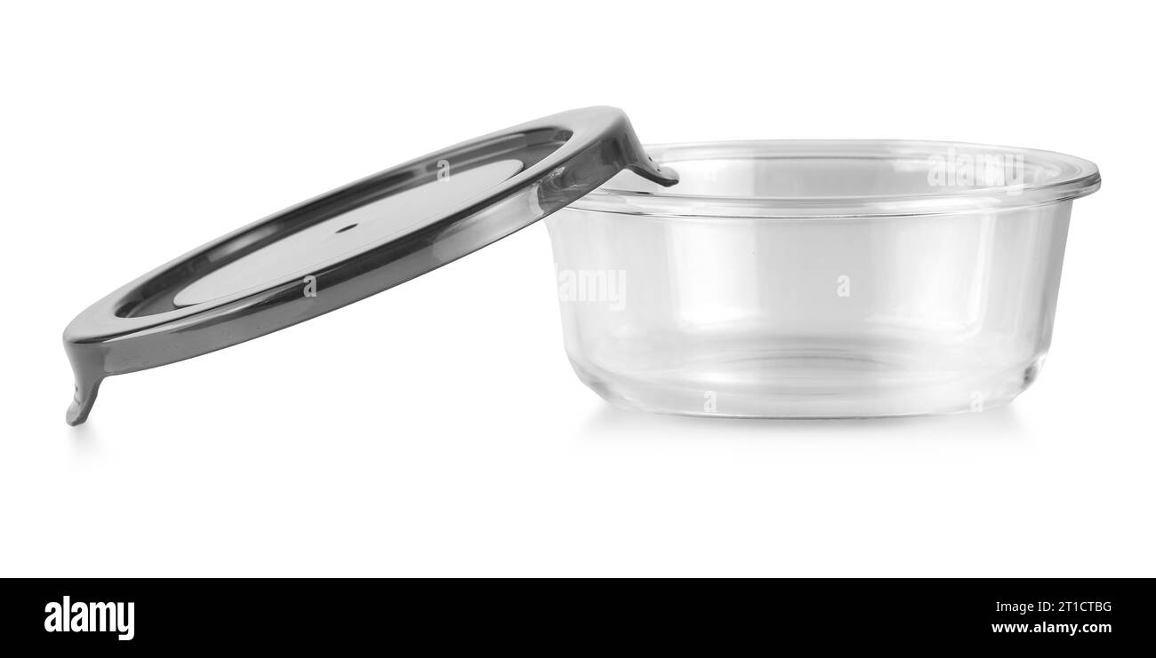 Le récipient alimentaire en verre avec couvercle en plastique vert isolé sur blanc Banque D'Images