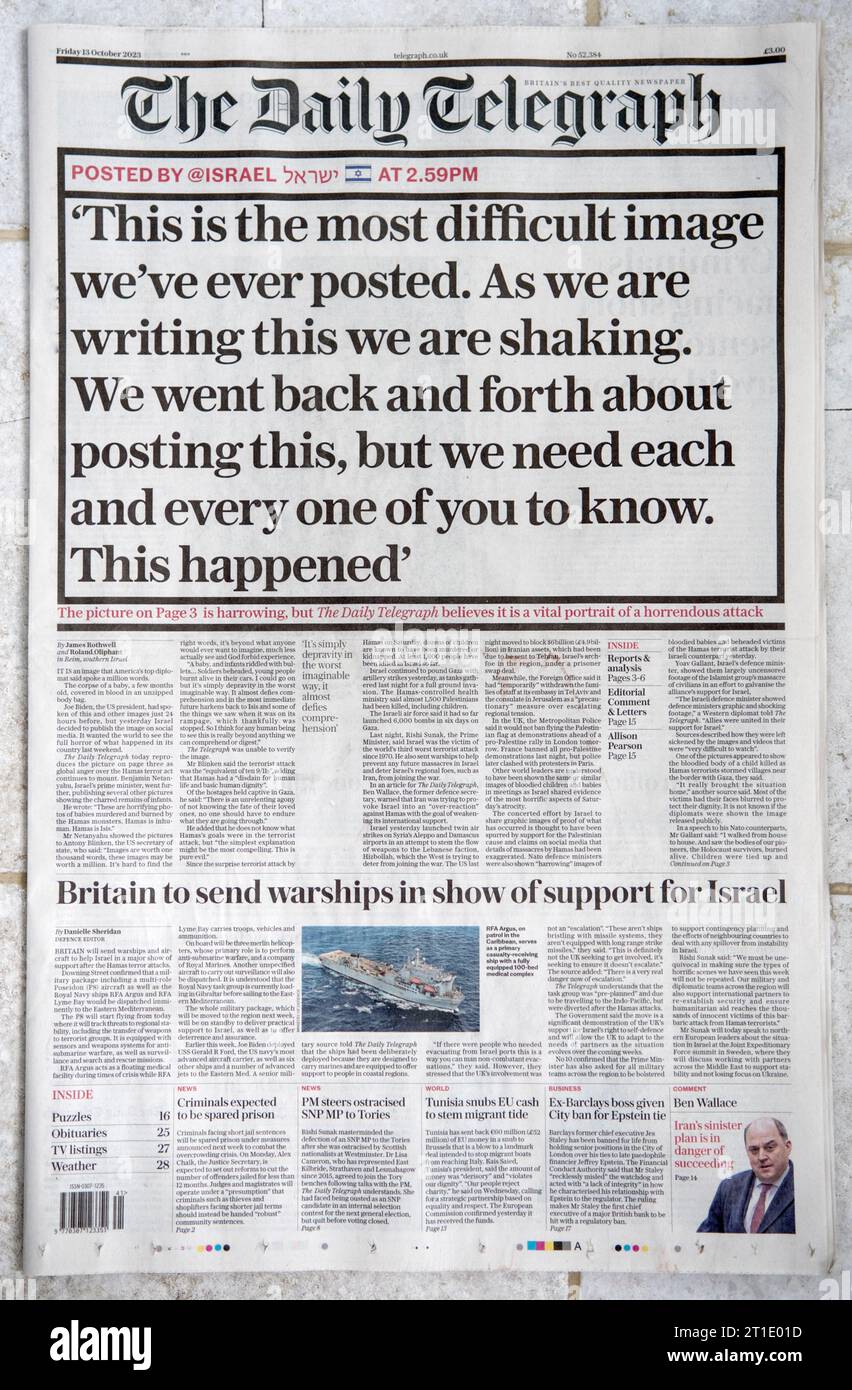 Le journal The Daily Telegraph vendredi 13 octobre 2023, reportage sur le meurtre de bébés par des terroristes du Hamas dans un kibboutz israélien. HOMER SYKES des années 2000 Banque D'Images