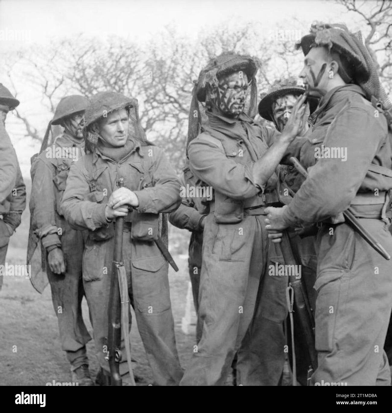 L'Armée britannique au Royaume-Uni des troupes 1939-45 camouflant leur visage à un stade avancé de la manipulation et de l'école de campagne à Llanberis au Pays de Galles, le 18 mars 1943. Banque D'Images