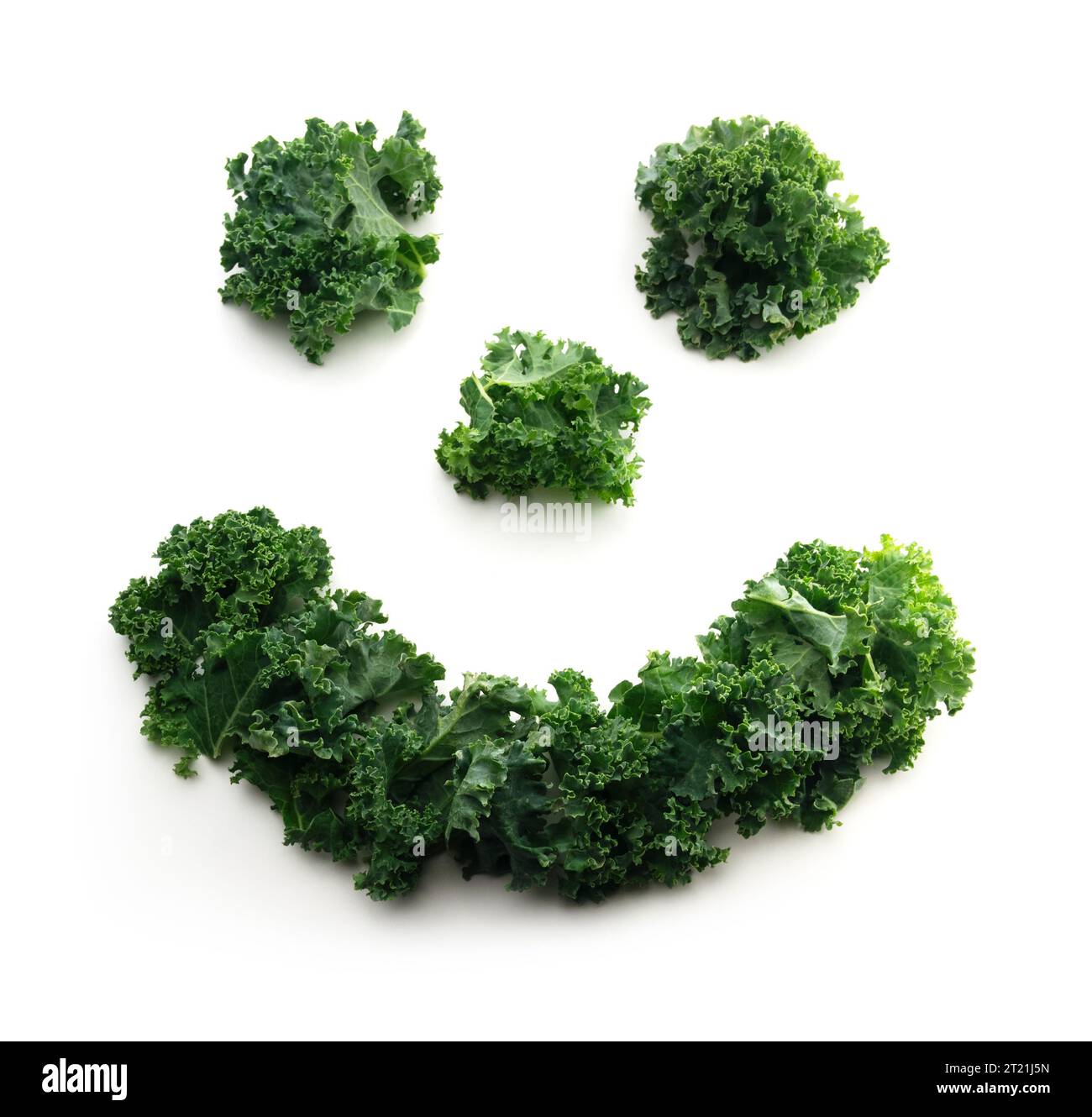 Isolé heureux souriant Veggie Kale Banque D'Images