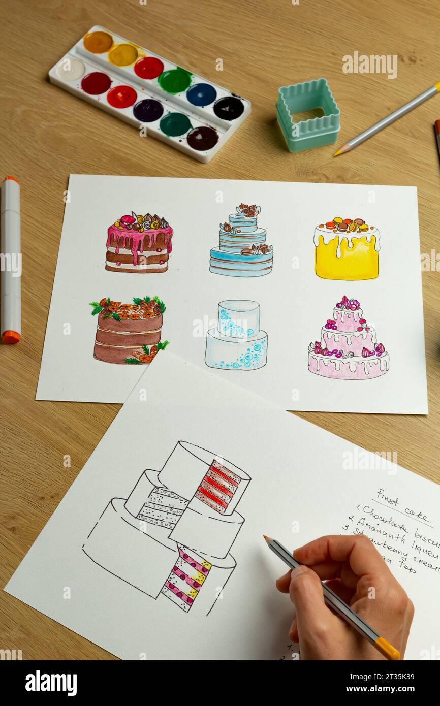 Esquisses de créateurs de gâteaux dessinés sur papier. Banque D'Images
