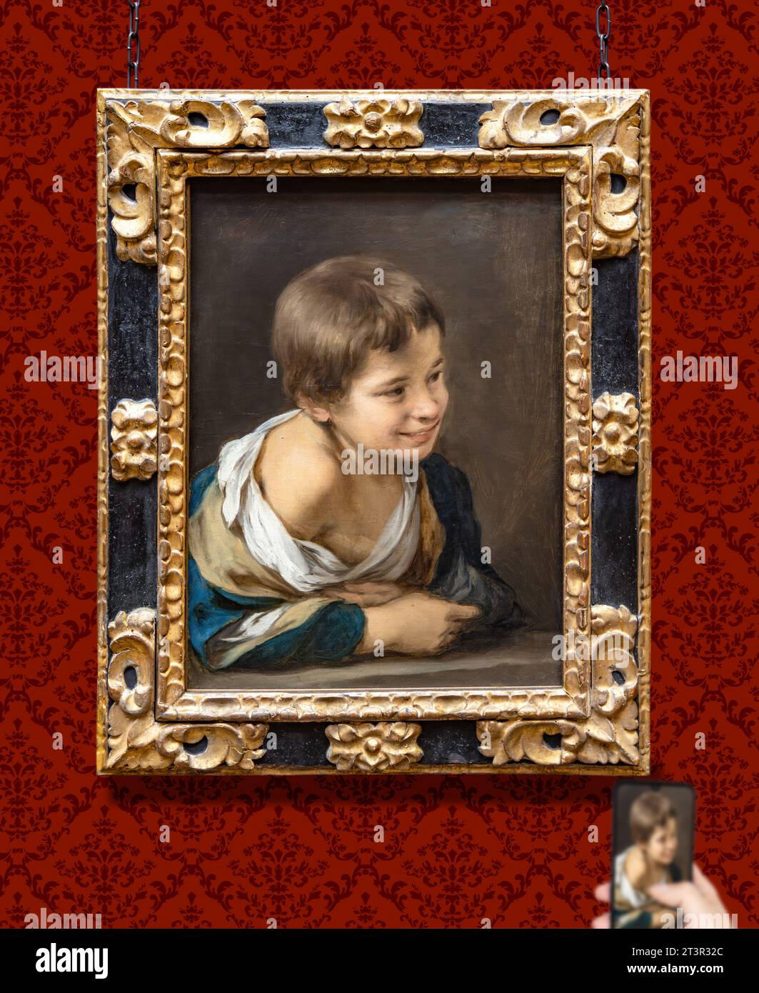 Londres, Royaume-Uni-19 mai 2023 : peinture de Bartolome Esteban Murillo intitulée Un garçon paysan penché sur un seuil exposée à la National Gallery de Londres, Angleterre Banque D'Images