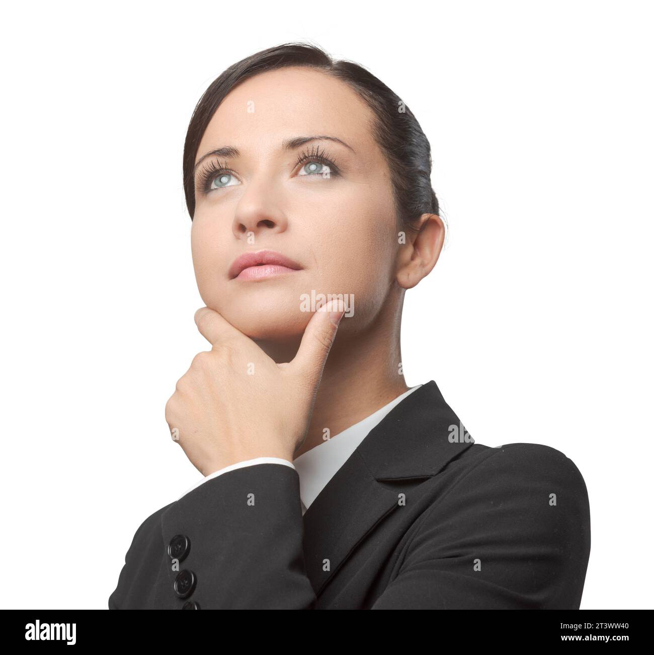 Femme d'affaires attrayant pensive witth main sur Menton à la route. Banque D'Images Femme d'affaires attrayant pensive witth main sur Menton à la route. Banque D'Images