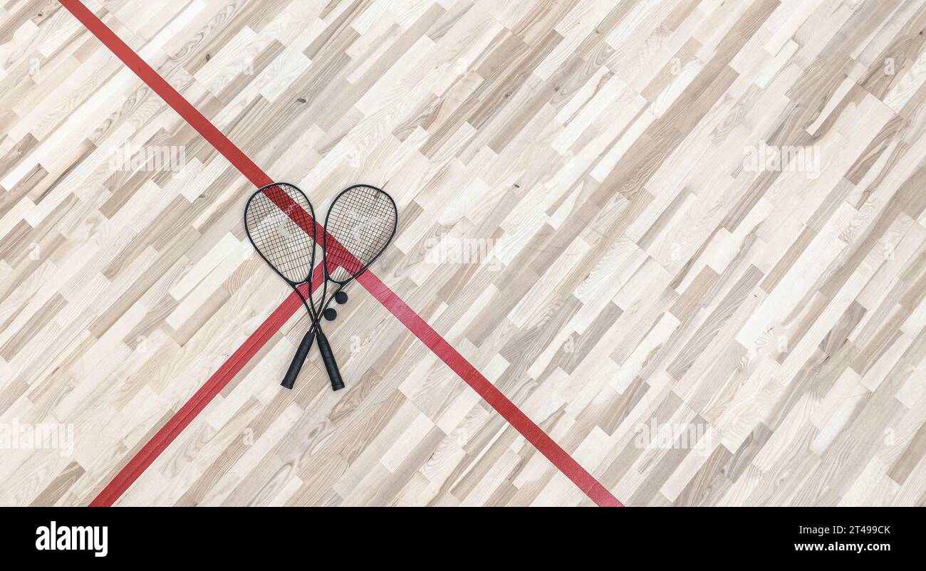 Squash Racket et ball Sport joué par deux ou quatre joueurs. Court Floor et les Rockets Banque D'Images