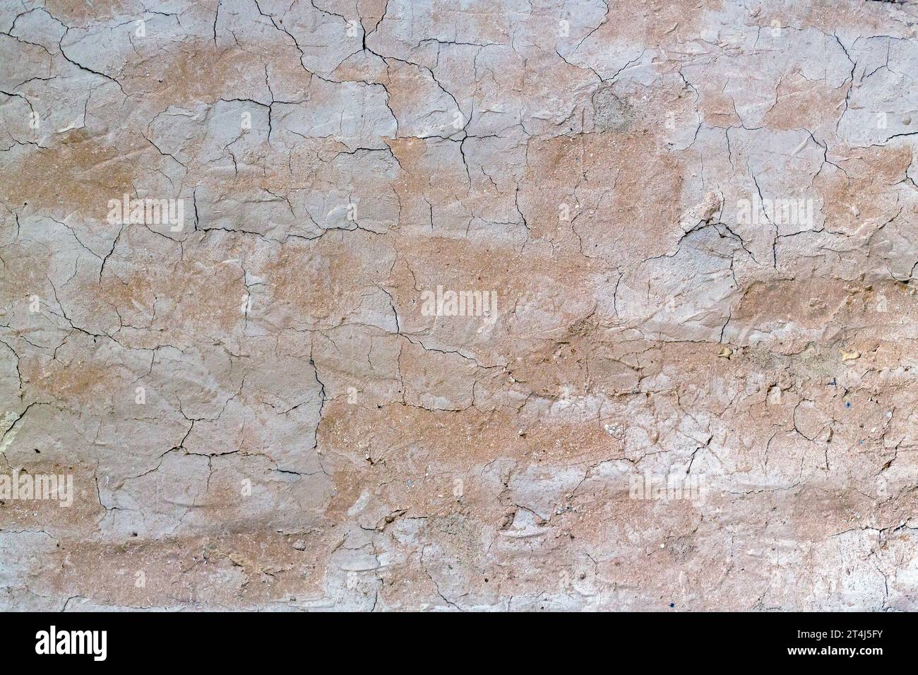Texture de fond détaillée d'un mur de boue adobe Banque D'Images