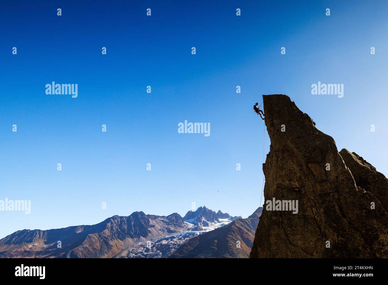 Grimpeur sportif sur l’Aiguillette d’Argentière à Chamonix Banque D'Images