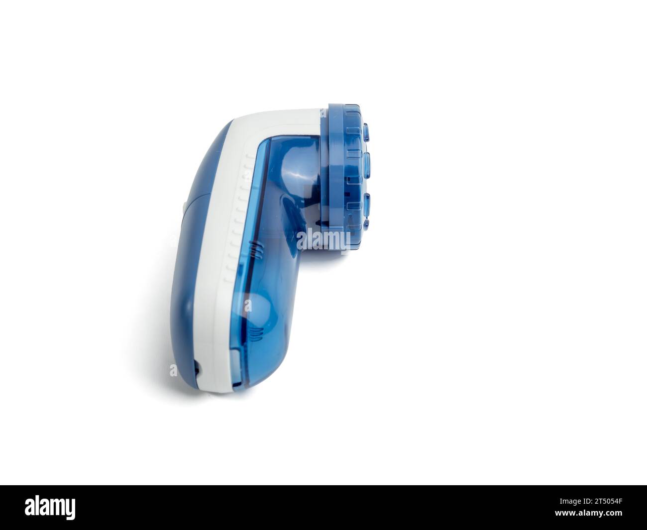 Machine pour couper des granulés et enlever des peluches d'un tissu. Un dispositif spécial pour enlever les peluches et les granulés du tissu. Banque D'Images