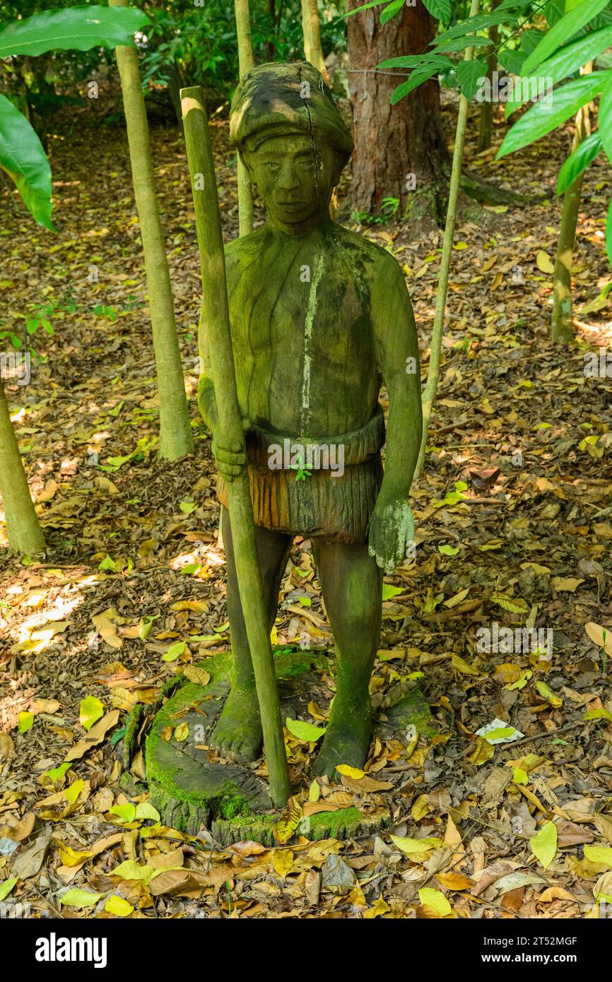 Une sculpture Hunter-Gatherer au Singapore Botanic Gardens, Singapour Banque D'Images