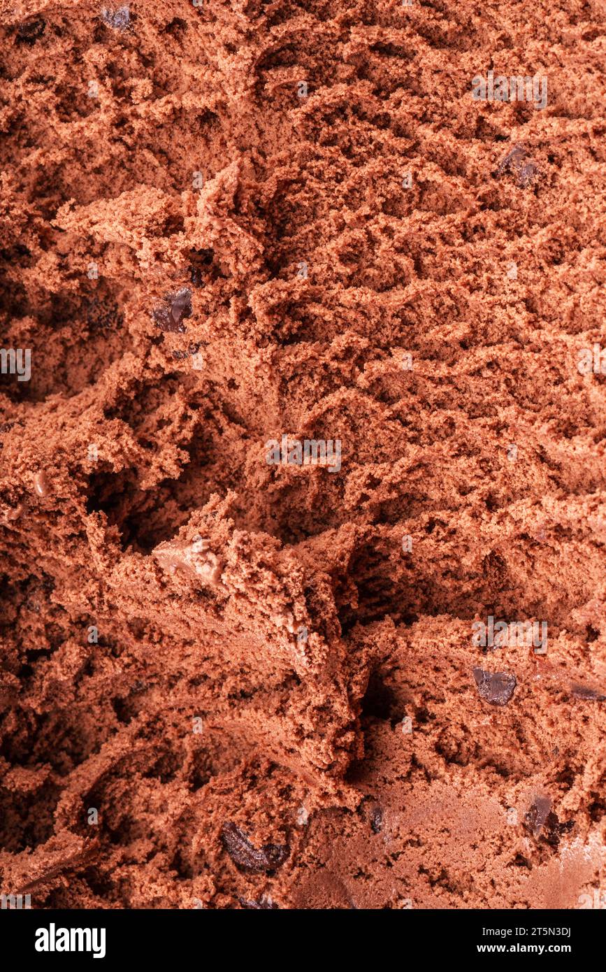 Structure de la crème glacée au chocolat congelé gros plan. Fond de crème glacée. Banque D'Images