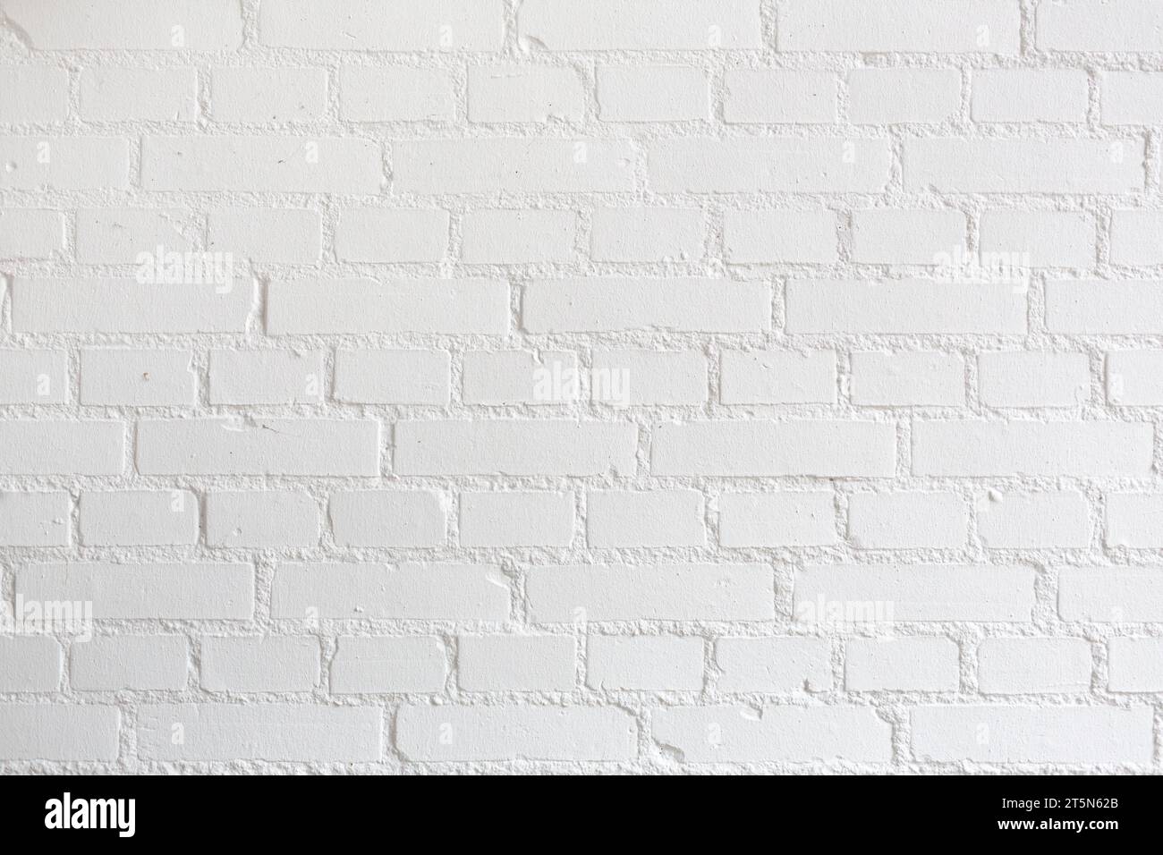 Photographie d'un mur de briques peintes en blanc. parfait pour saisir du texte et des images Banque D'Images