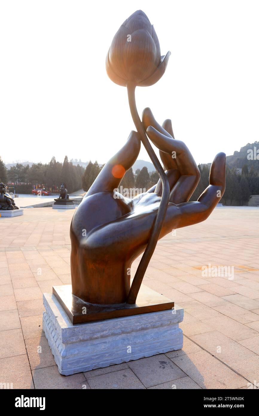 Sculpture à la main et au lotus Banque D'Images