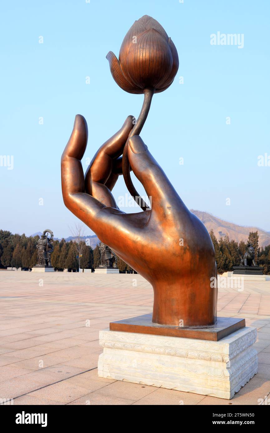 Sculpture à la main et au lotus Banque D'Images