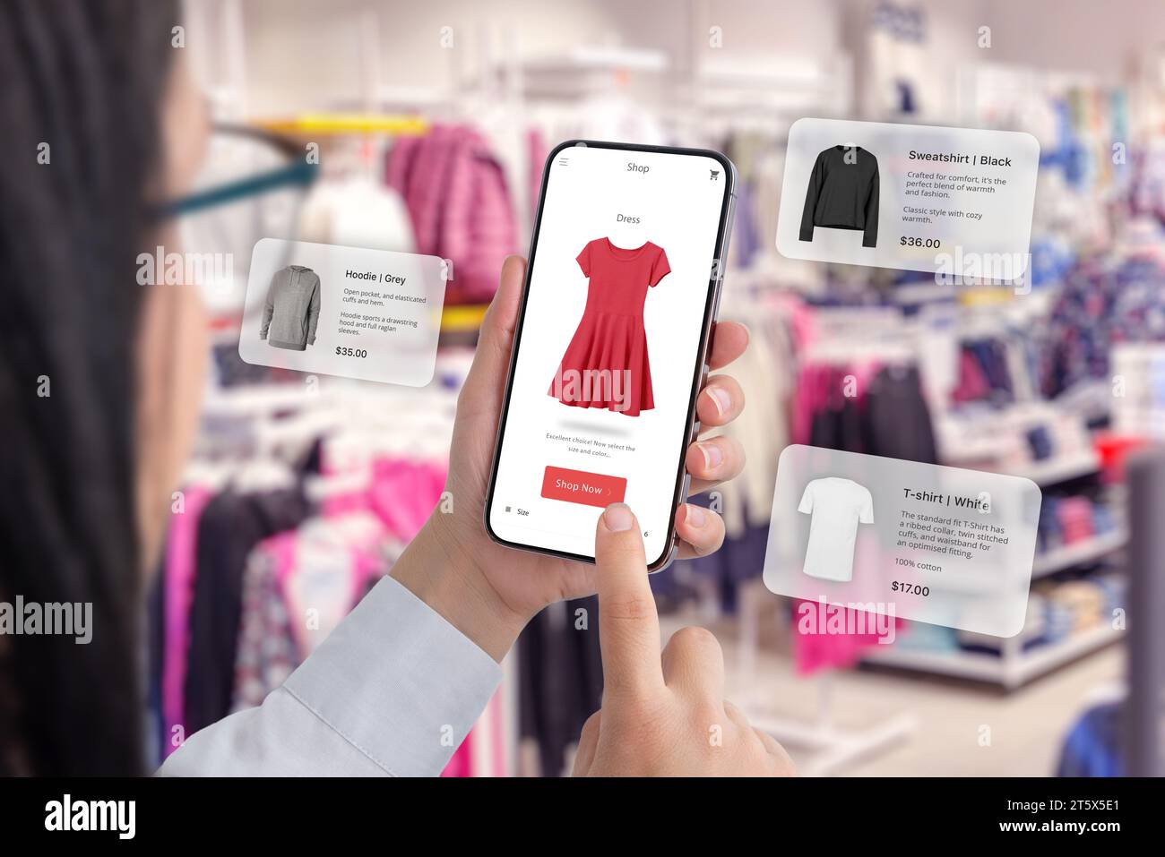 Boutique de vêtements grâce à une application smartphone avec des ballons autour suggérant des recommandations de vêtements Banque D'Images
