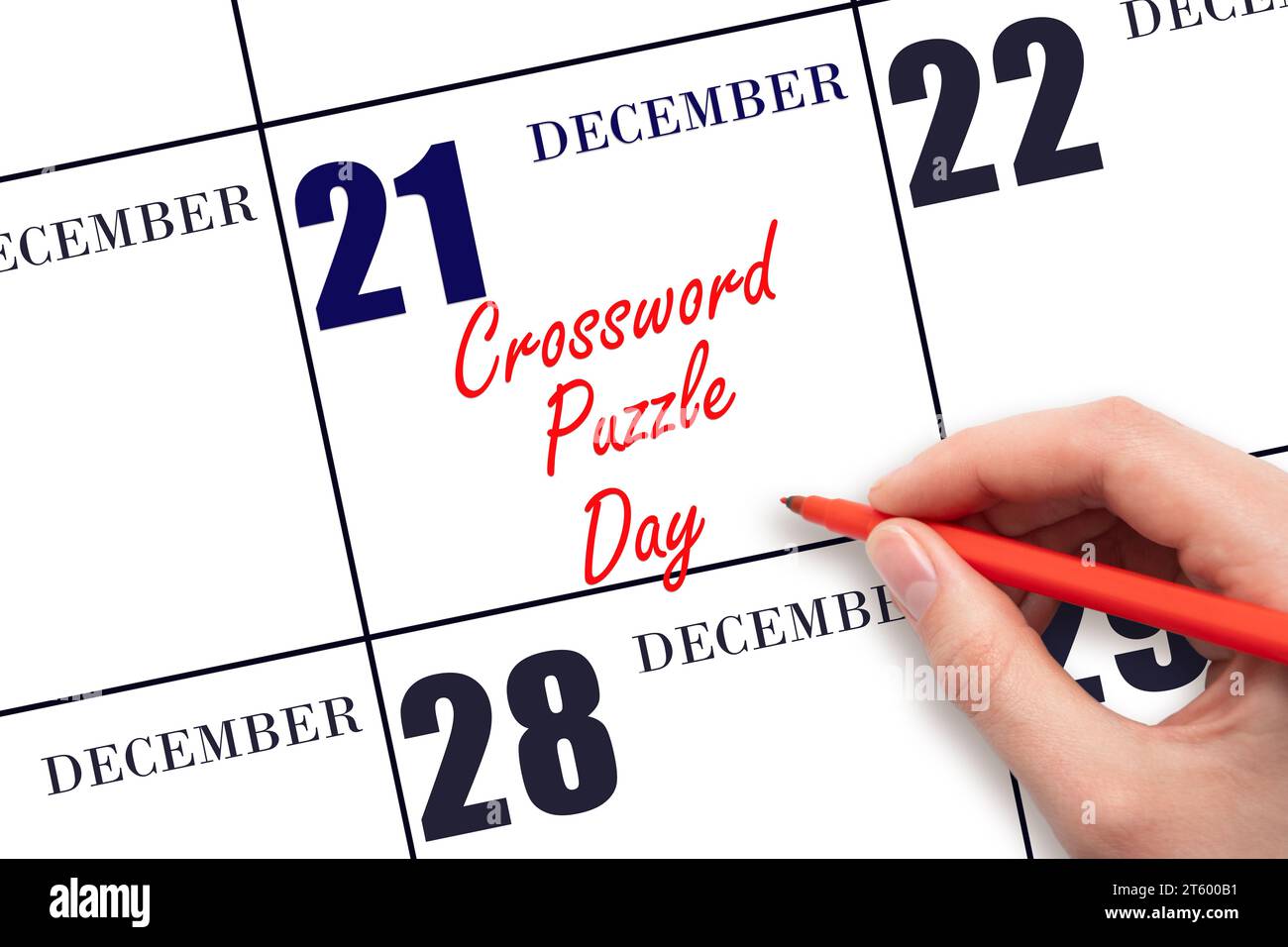 Décembre 21. Texte d'écriture à la main Crossword Puzzle Day à la date du calendrier. Enregistrez la date. Vacances. Concept du jour de l'année. Banque D'Images