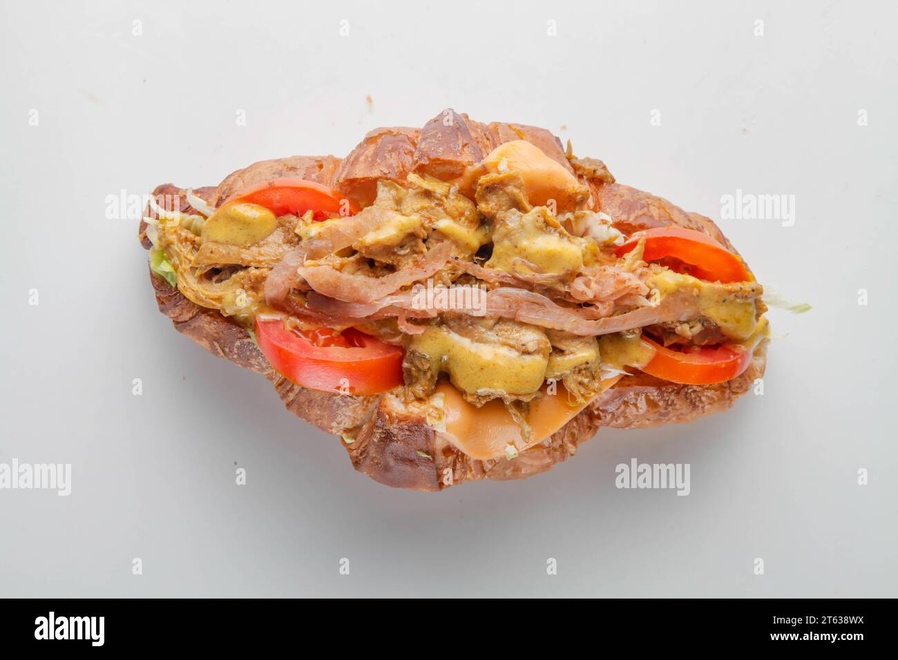 Sandwich épicé au poulet croissant asiatique Banque D'Images