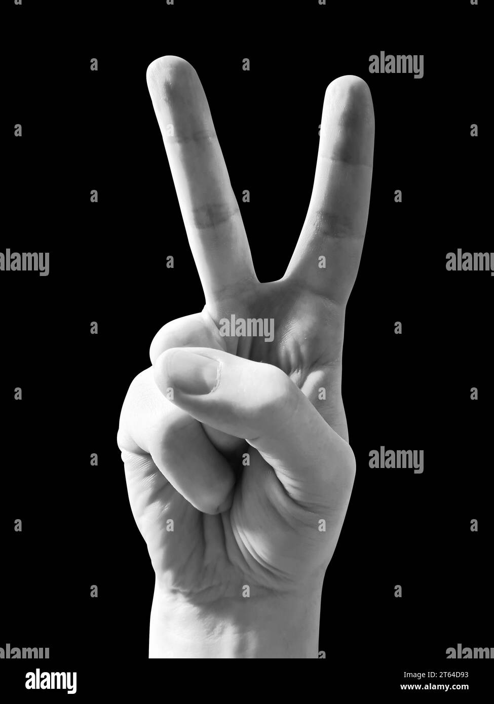 Main humaine montrant deux doigts - signe de paix Banque D'Images