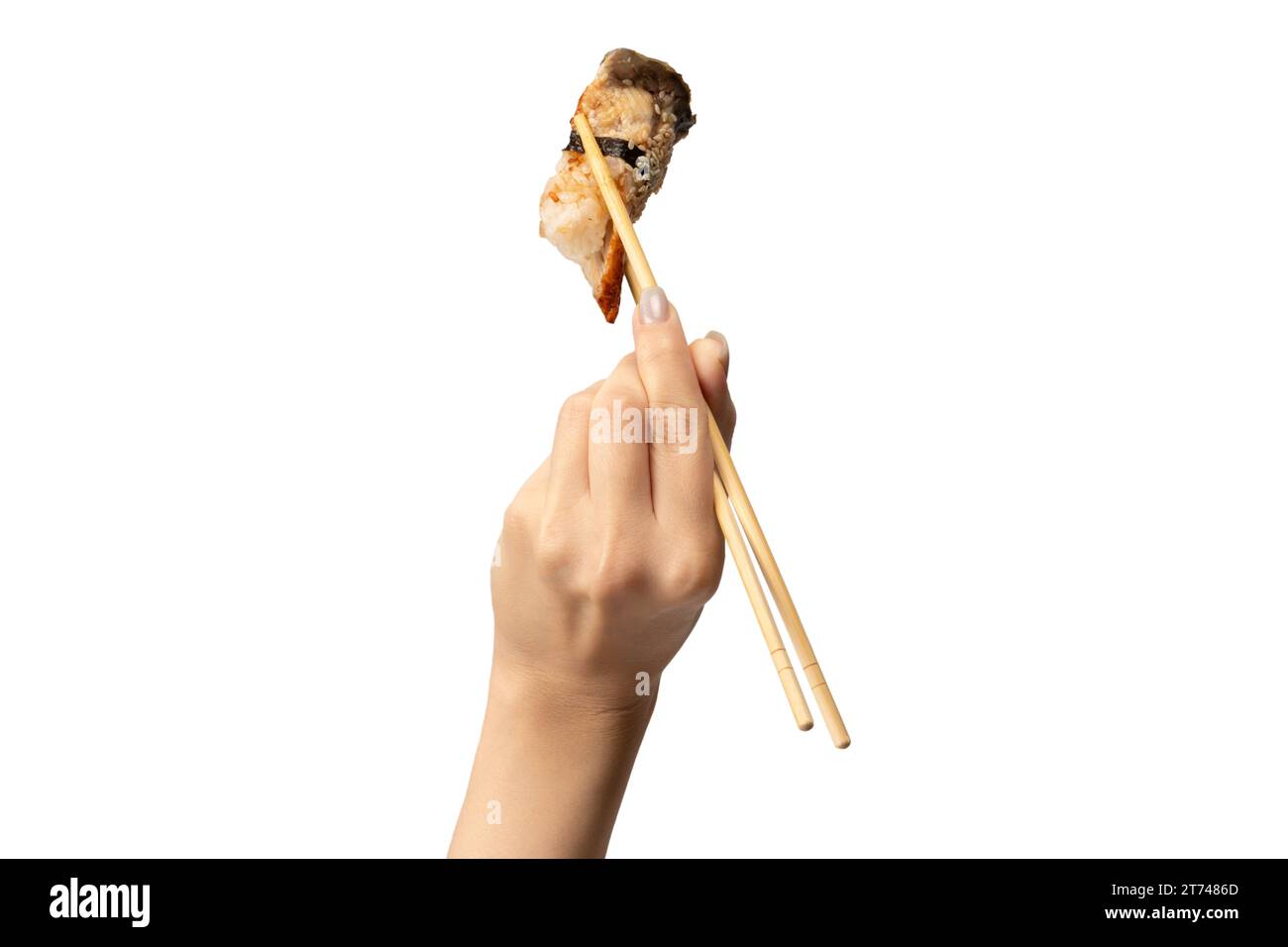 Sushi unagi dans une main de femme isolé sur un fond blanc. Banque D'Images