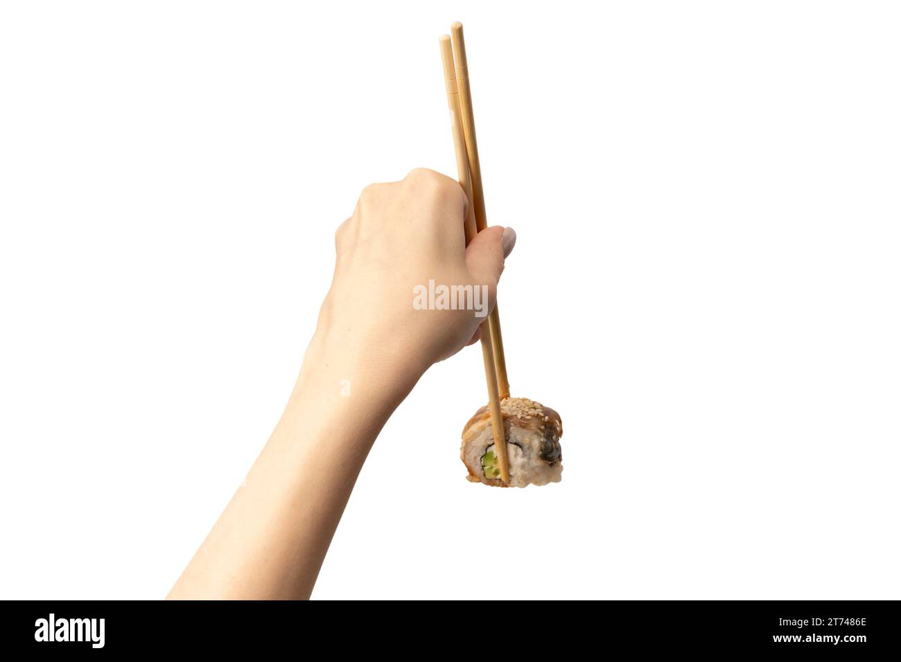 Sushi unagi dans une main de femme isolé sur un fond blanc. Banque D'Images