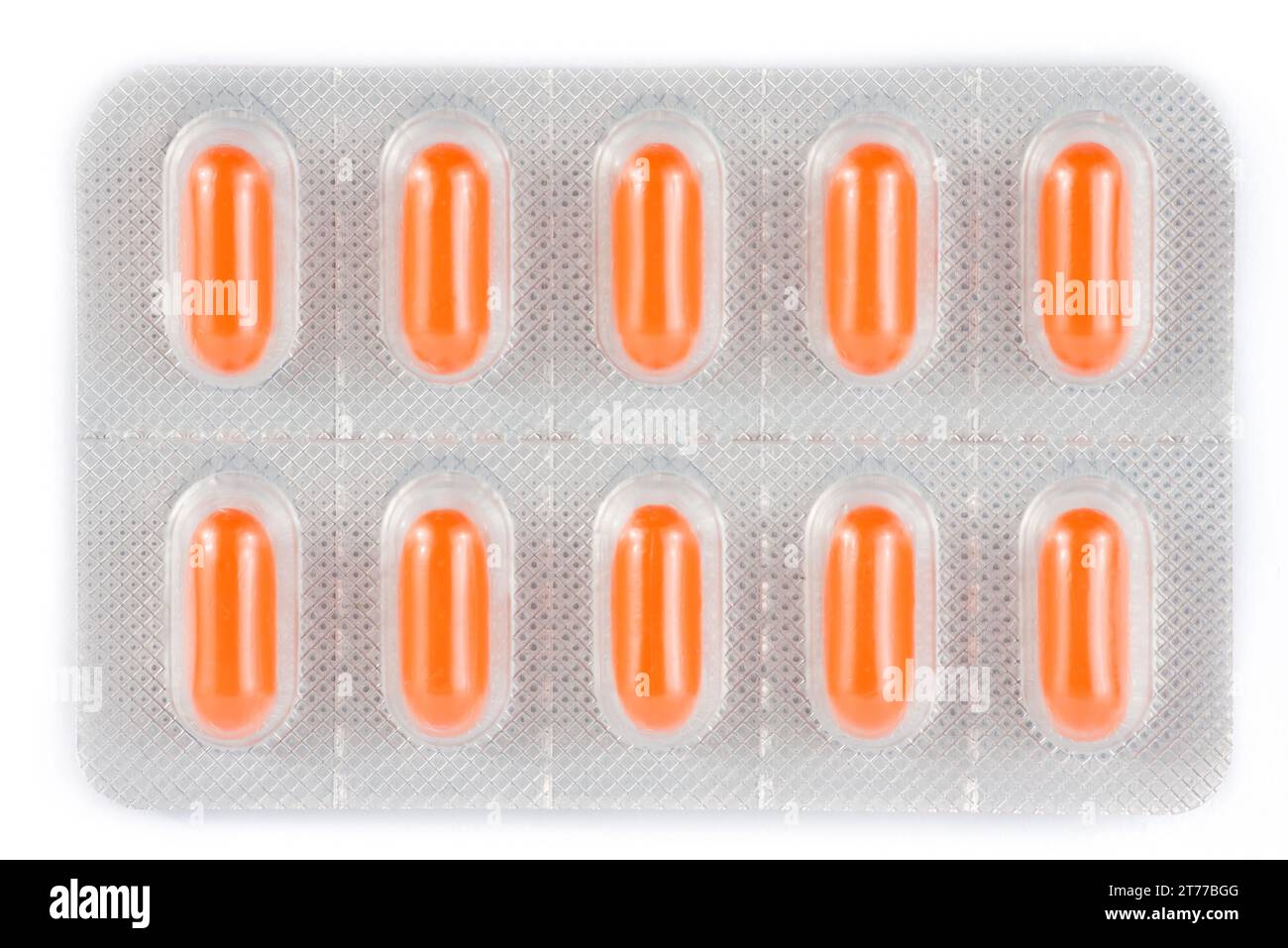 dessus de la vue des pilules orange emballées dans blister sur fond blanc Banque D'Images