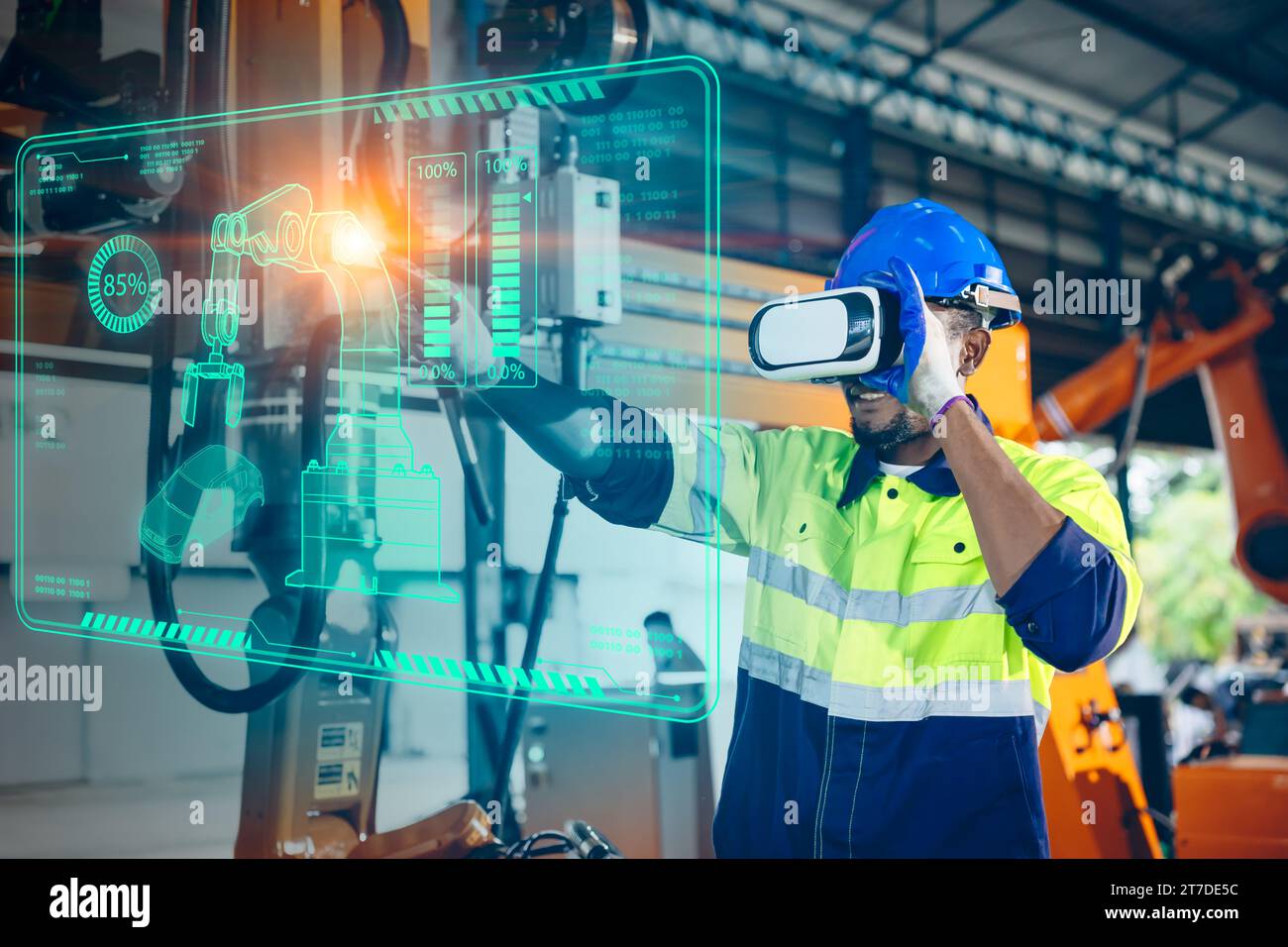 L'ingénieur utilise le contrôle de la technologie de réalité virtuelle VR faire fonctionner la machine robot dans la nouvelle innovation d'usine moderne dans l'industrie de l'ingénierie Banque D'Images