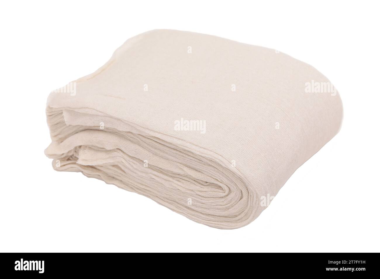 grand paquet de chiffons de nettoyage blanc cassé repliés sur eux-mêmes. Banque D'Images