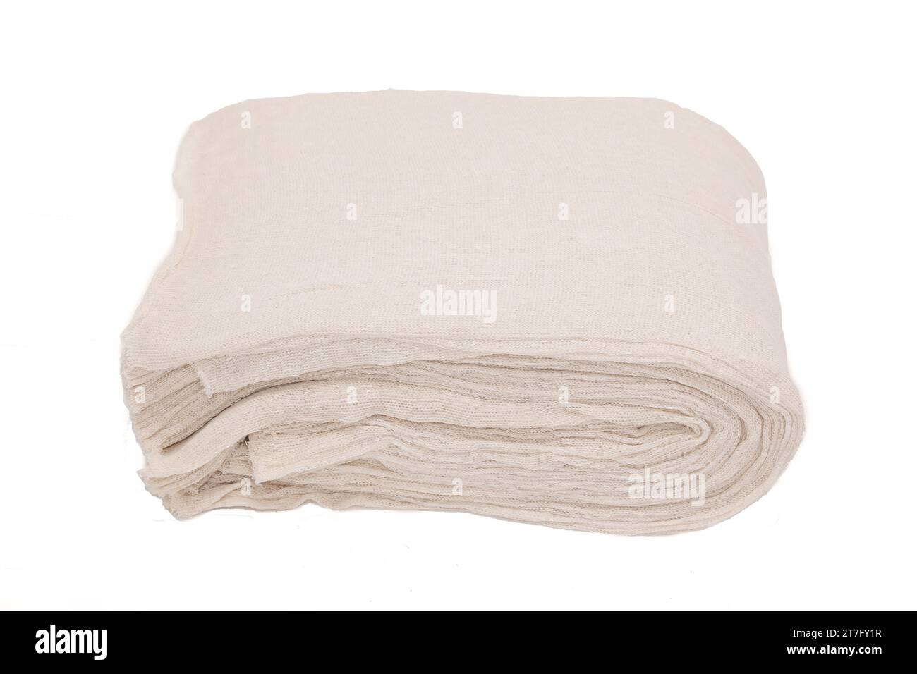 grand paquet de chiffons de nettoyage blanc cassé repliés sur eux-mêmes comme vu de côté. Banque D'Images