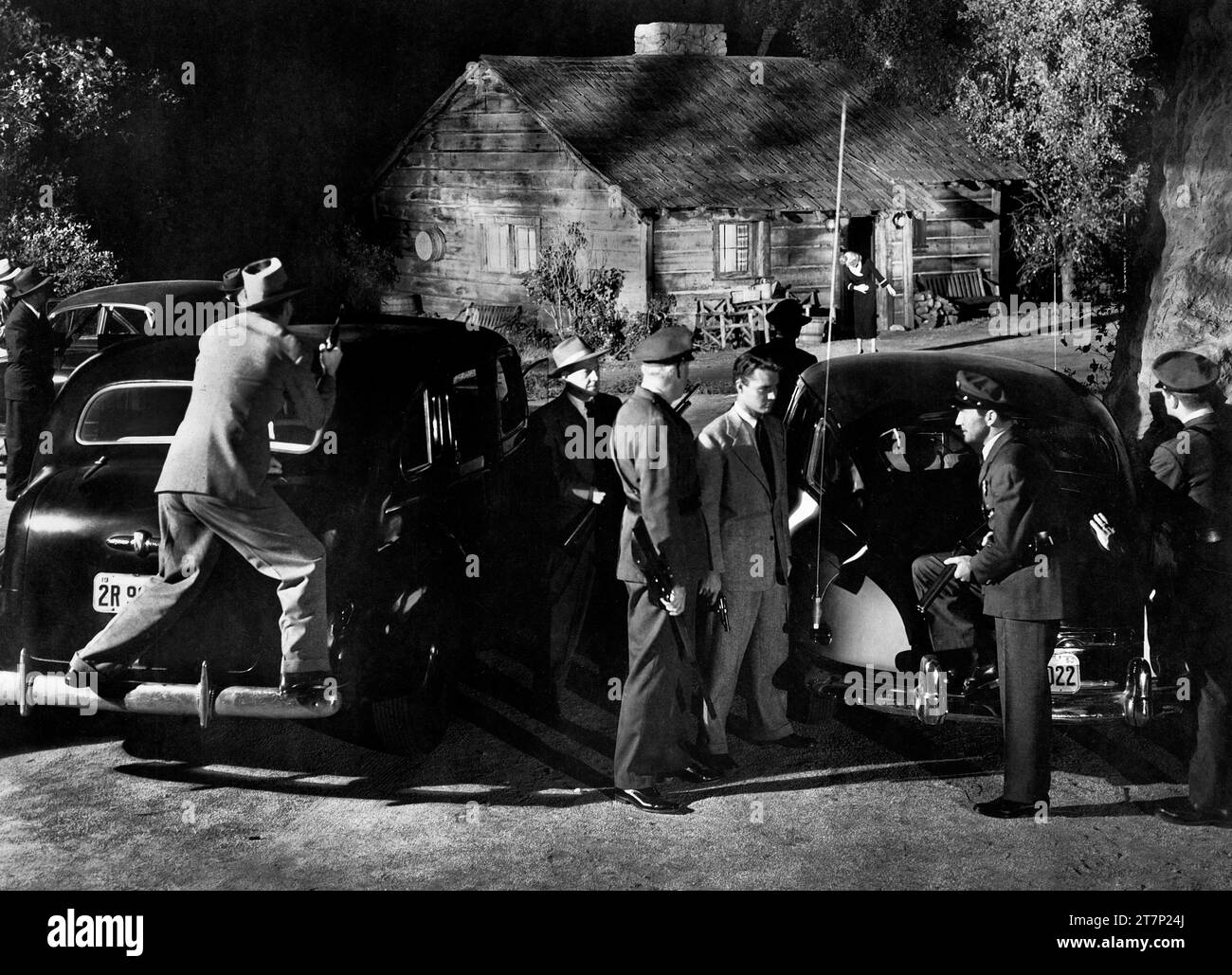 Dorothy Patrick (quittant la maison), Richard Travis (costume léger), sur le plateau du film, 'Lonely Heart banditss', Republic Pictures, 1950 Banque D'Images