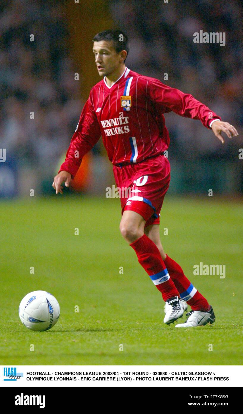 FOOTBALL - LIGUE DES CHAMPIONS 2003/04 - 1ST ROUND - 030930 - CELTIC GLASGOW V OLYMPIQUE LYONNAIS - ERIC CARRIERE (LYON) - PHOTO LAURENT BAHEUX / FLASH PRESS Banque D'Images