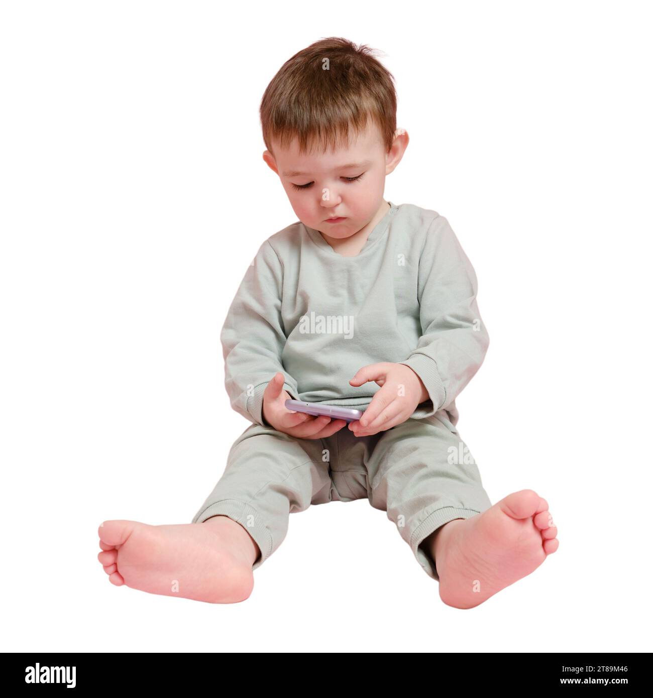 Enfant Tenant Un Téléphone Portable Sur Fond Blanc