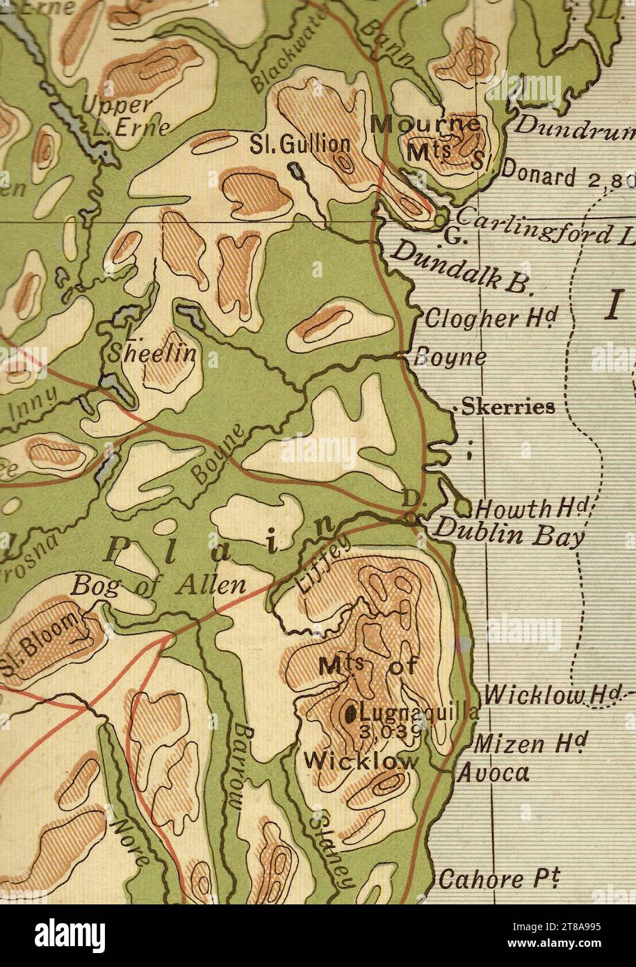 Une ancienne carte géographique en couleur sépia de l'Irlande montrant Dublin et la côte est. Banque D'Images