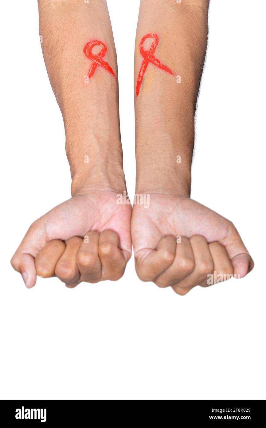 La main humaine montre un symbole de conscience de ruban rouge. Concept de la Journée mondiale du sida Banque D'Images