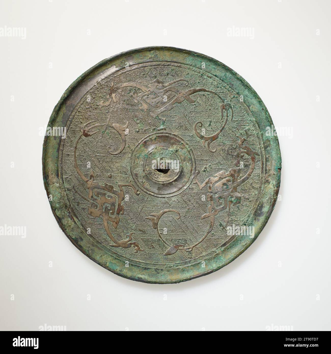 Miroir, 4e-3e siècle av. J.-C., 6 1/4 × 1/4 po., 0,7 lb. (15,88 × 0,64 cm, 0,3 kg), Bronze, Chine, 4e-3e siècle av. J.-C. Banque D'Images
