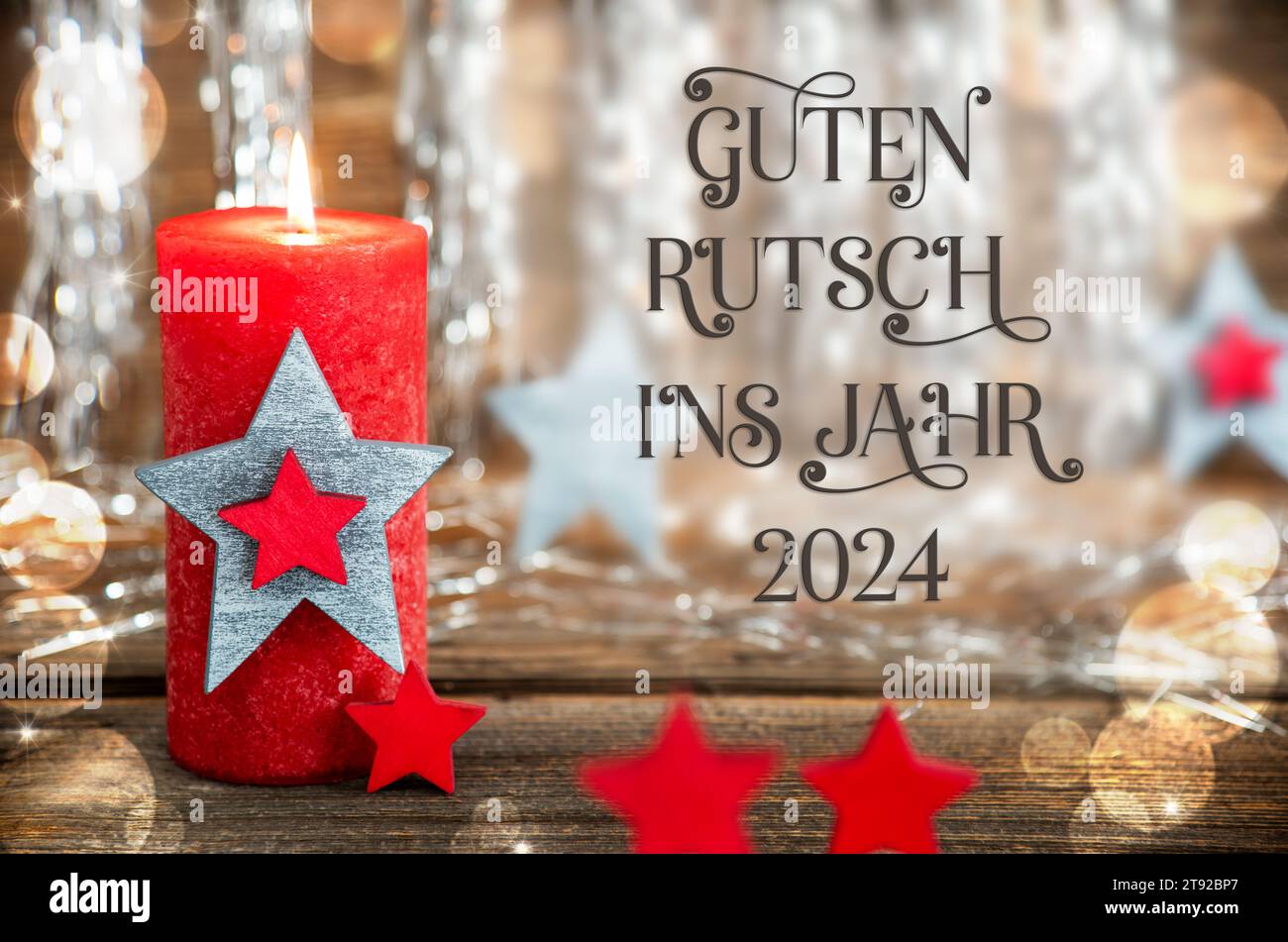Texte Guten Rutsch 2024, signifie heureux 2024, avec bougie, fond de Noël Banque D'Images