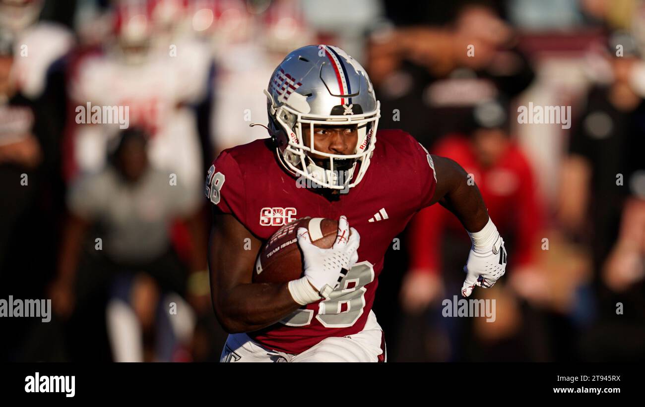 Troy running back Kimani Vidal (28) runs against Louisiana-Lafayette during the first half of an NCAA college football game, Saturday, Nov. 18, 2023, in Troy, Ala. (AP Photo/Mike Stewart) Banque D'Images