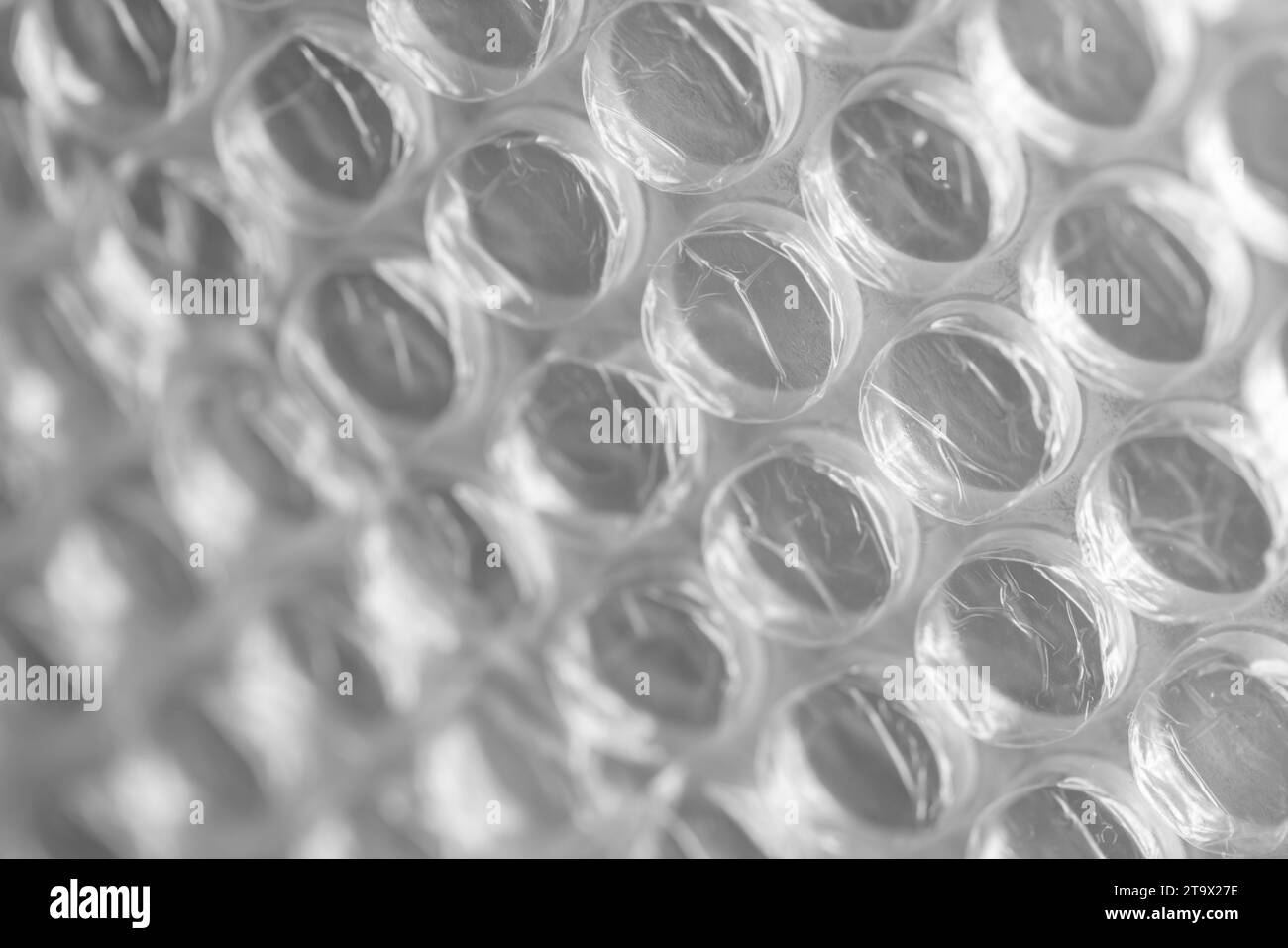 Photo macro à bulles avec mise au point sélective. C'est une matière plastique transparente pliable avec des bulles d'air utilisé pour emballer des articles fragiles Banque D'Images
