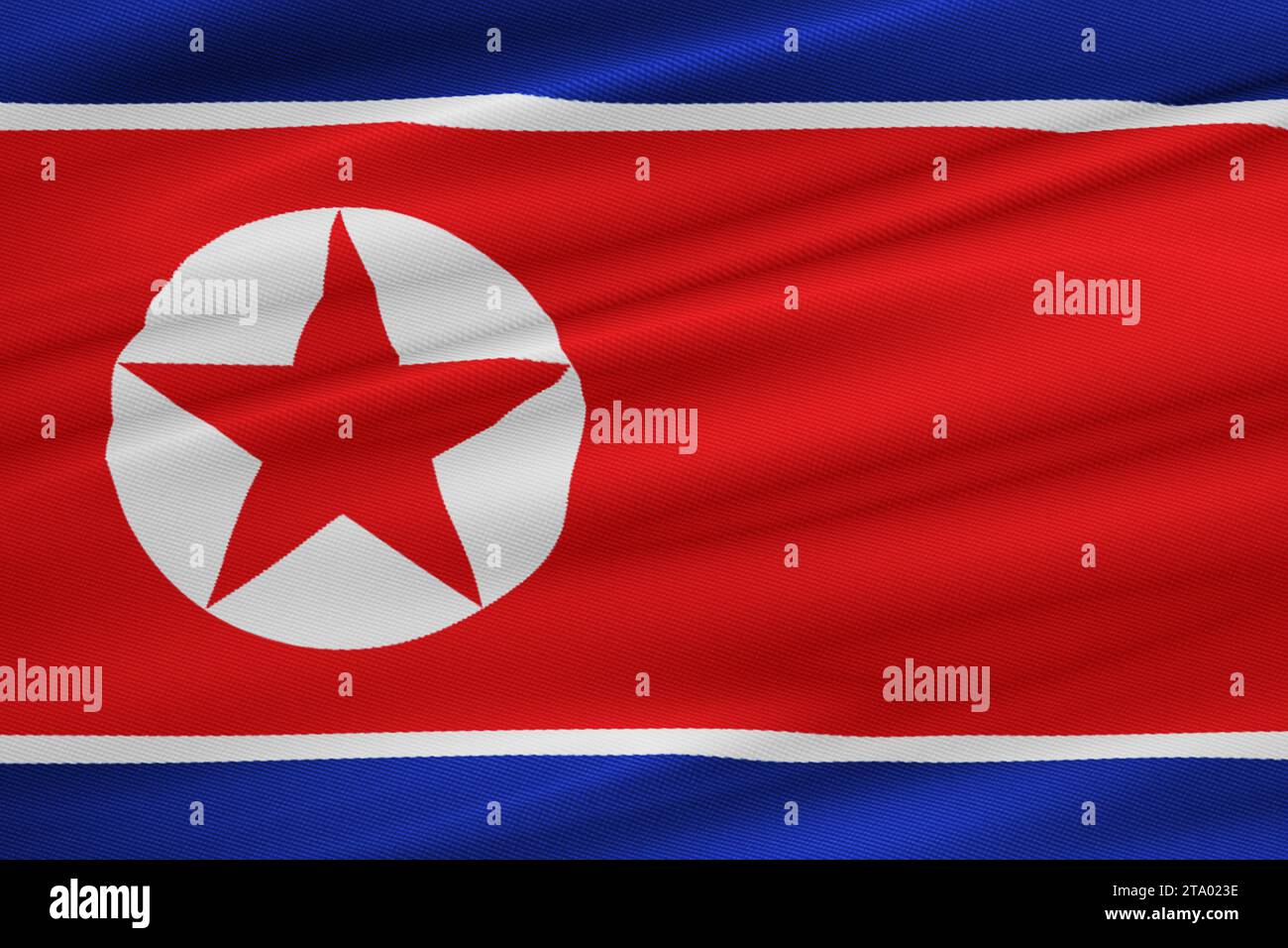Rendu 3D, drapeau nord-coréen agitant le fond de tissu de texture, crise de la corée du Nord et du Sud, concept coréen de guerre de bombe nucléaire de risque Banque D'Images