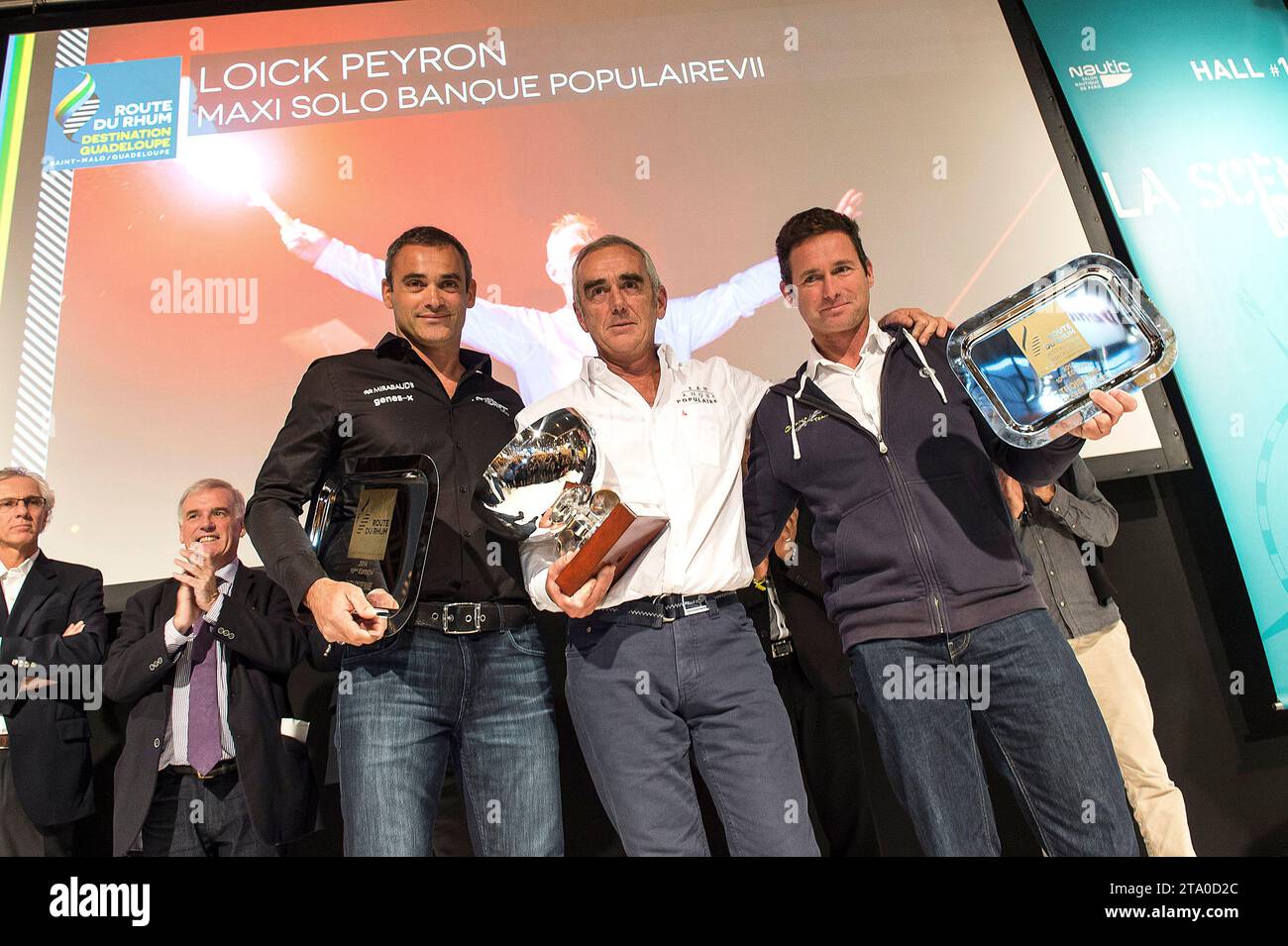 Podium de classe ultime avec Yann Guichard (2e), Loick Peyron (1e) et Sébastien Josse (3e) lors de la cérémonie de remise des prix route du Rhum 2014 au salon NAUTIC à Paris (France) le 06 décembre 2014 - photo Olivier Blanchet / DPPI Banque D'Images