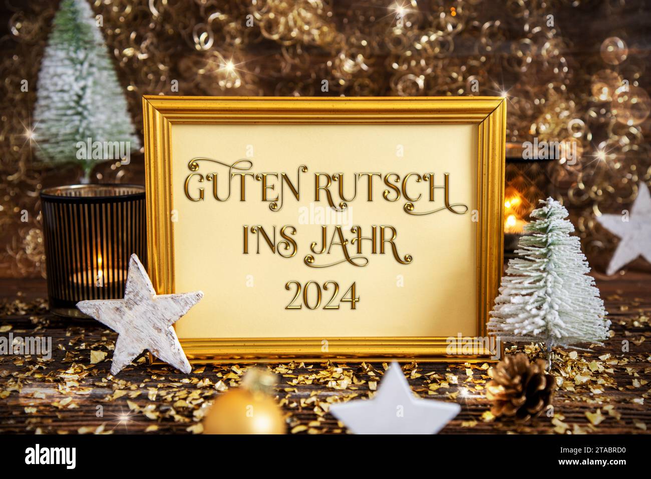 Cadre Guten Rutsch 2024, signifie heureux 2024, Décoration dorée de Noël Banque D'Images