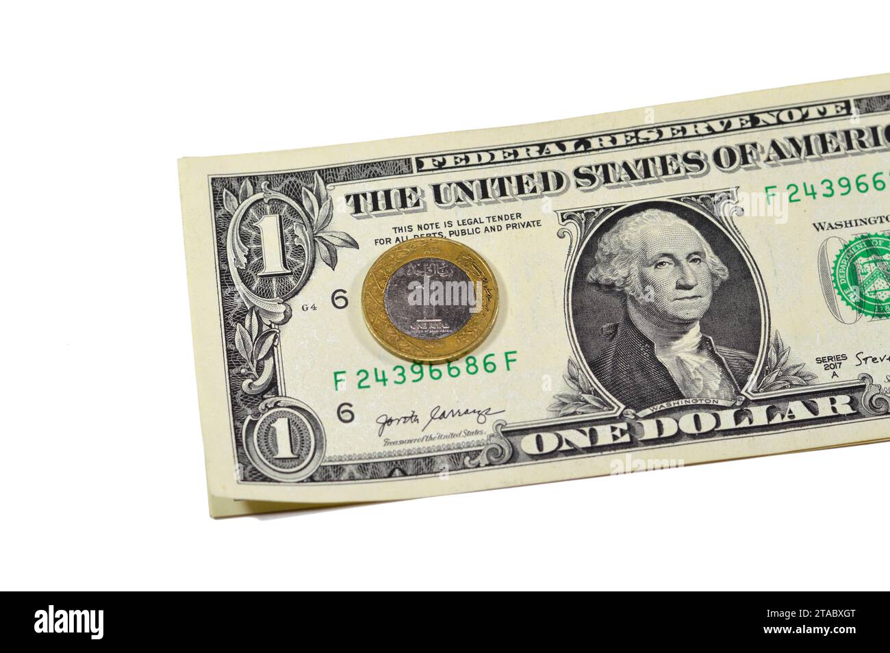 Une pièce de monnaie de riyal d'Arabie saoudite année 2016 sur fond de billet de papier de 1 dollar américain USD, un métal SAR et un billet de banque USD argent saoudien et américain, 1 S. Banque D'Images