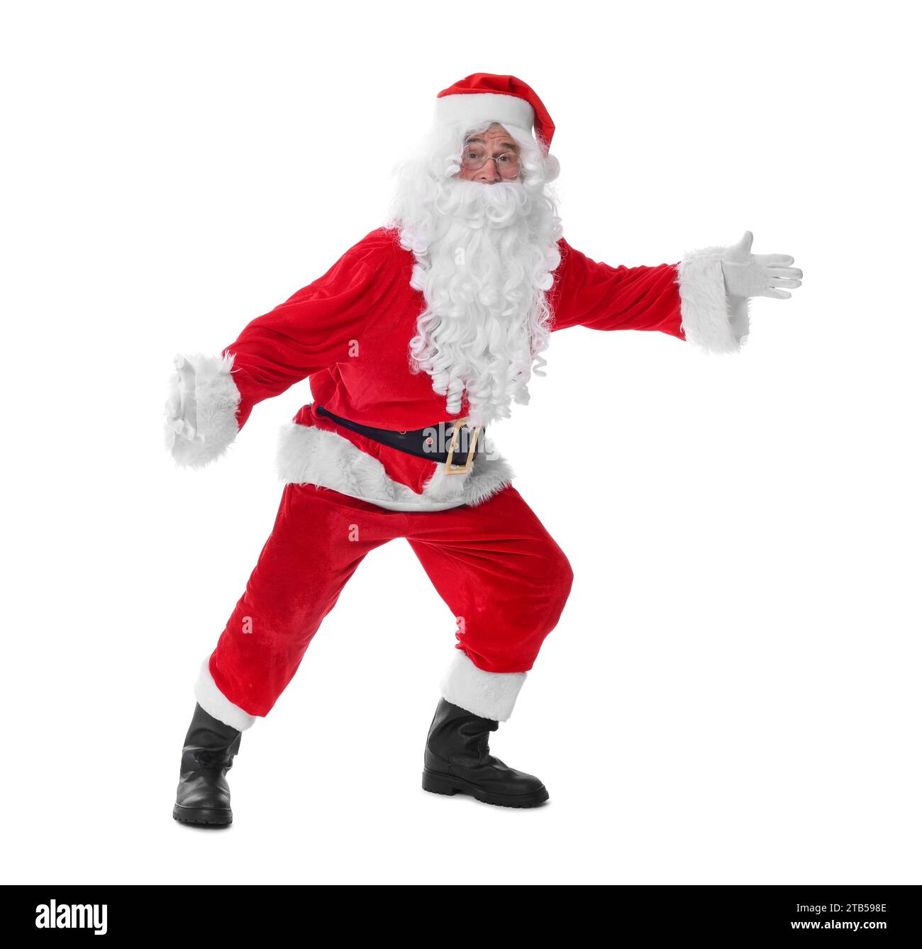 Homme en costume de Père Noël posant sur fond blanc Banque D'Images