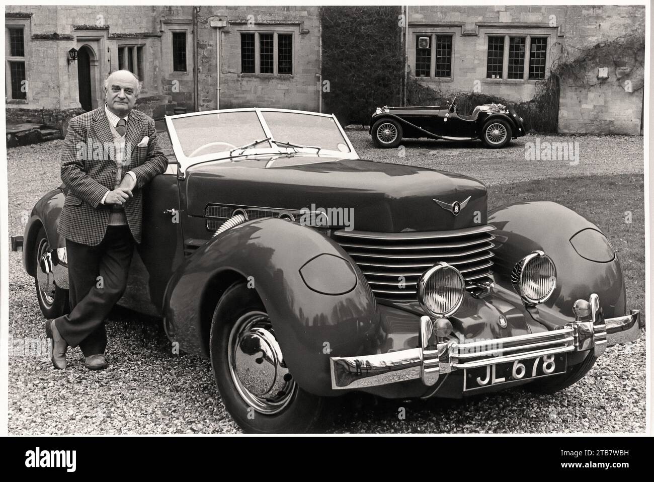 James Leasor avec son cordon et SS100 - photo de voiture vintage Banque D'Images