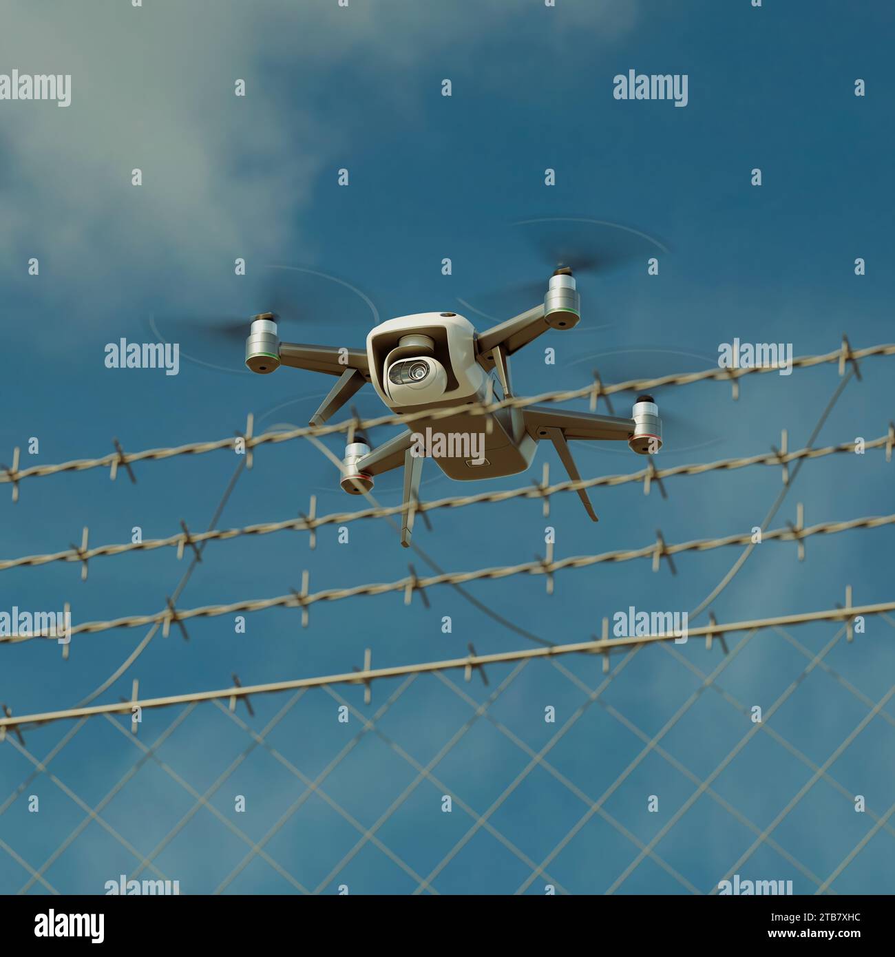 Drone quadcopter avancé avec caméra haute résolution plane près d'une clôture de fil de fer barbelé sécurisé contre un ciel dégagé, impliquant une surveillance intensive et Banque D'Images