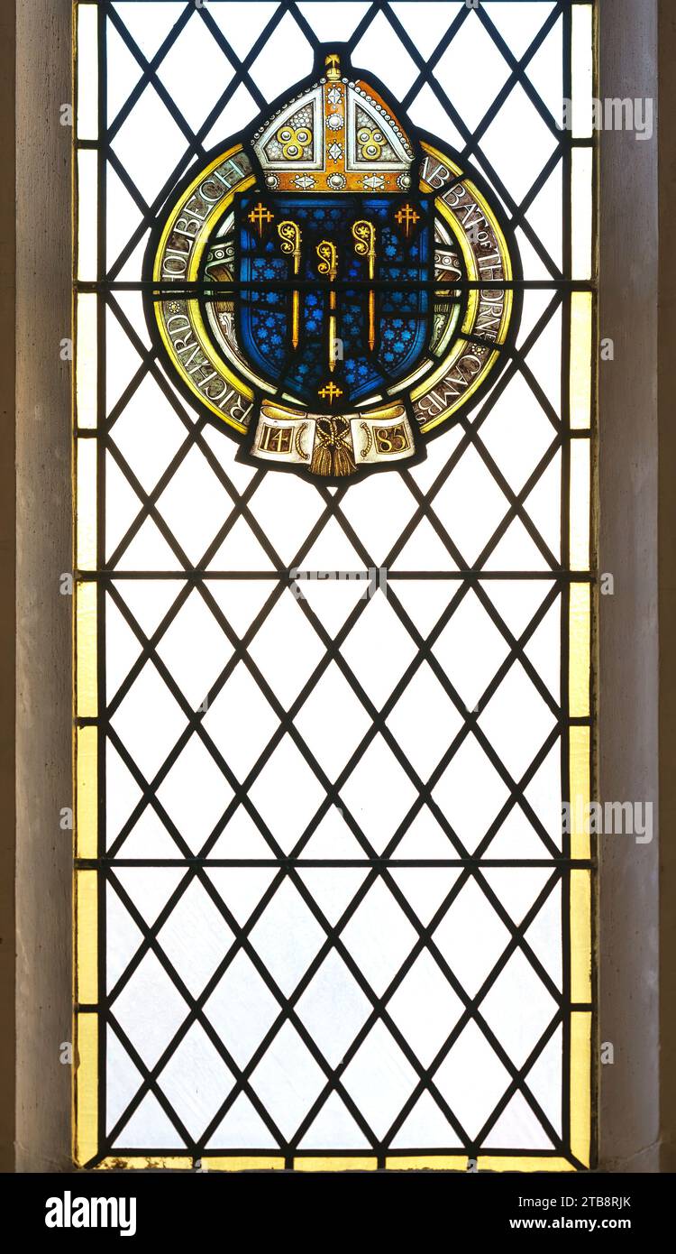 Un vitrail partiel, de Richard Holbech, Abbé de Thorne, Cambs, donneur 1485, église St Mary à Cambridge, Angleterre. Banque D'Images